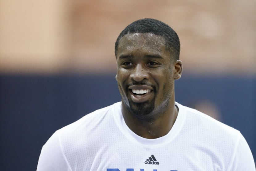Wesley Matthews smiles during Dallas Mavericks practice at American Airlines Center in...
