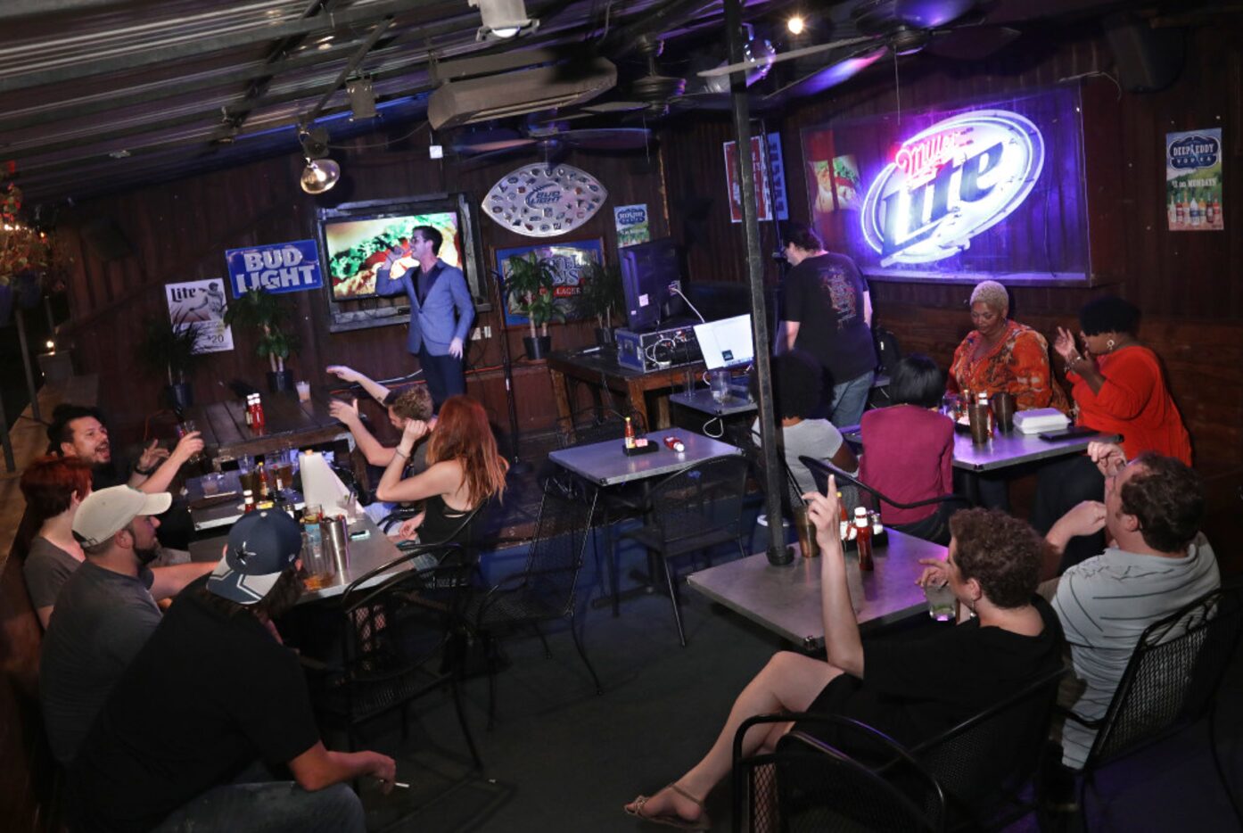 The patio at Shuck N Jive is overtaken by karaoke singers on Tuesday nights. 