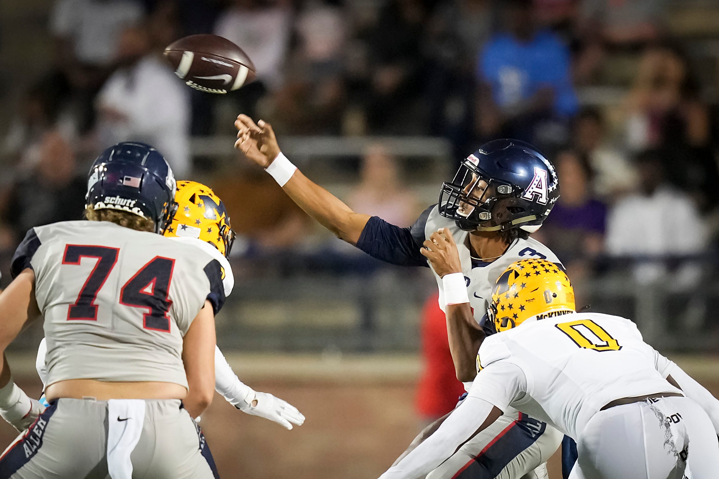 Allen quarterback Mike Hawkins (3) throws a pass under pressure from McKinney linebacker ...