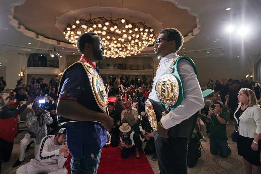 Terence Crawford (left) and DeSoto's Errol Spence Jr. face off during a press conference...
