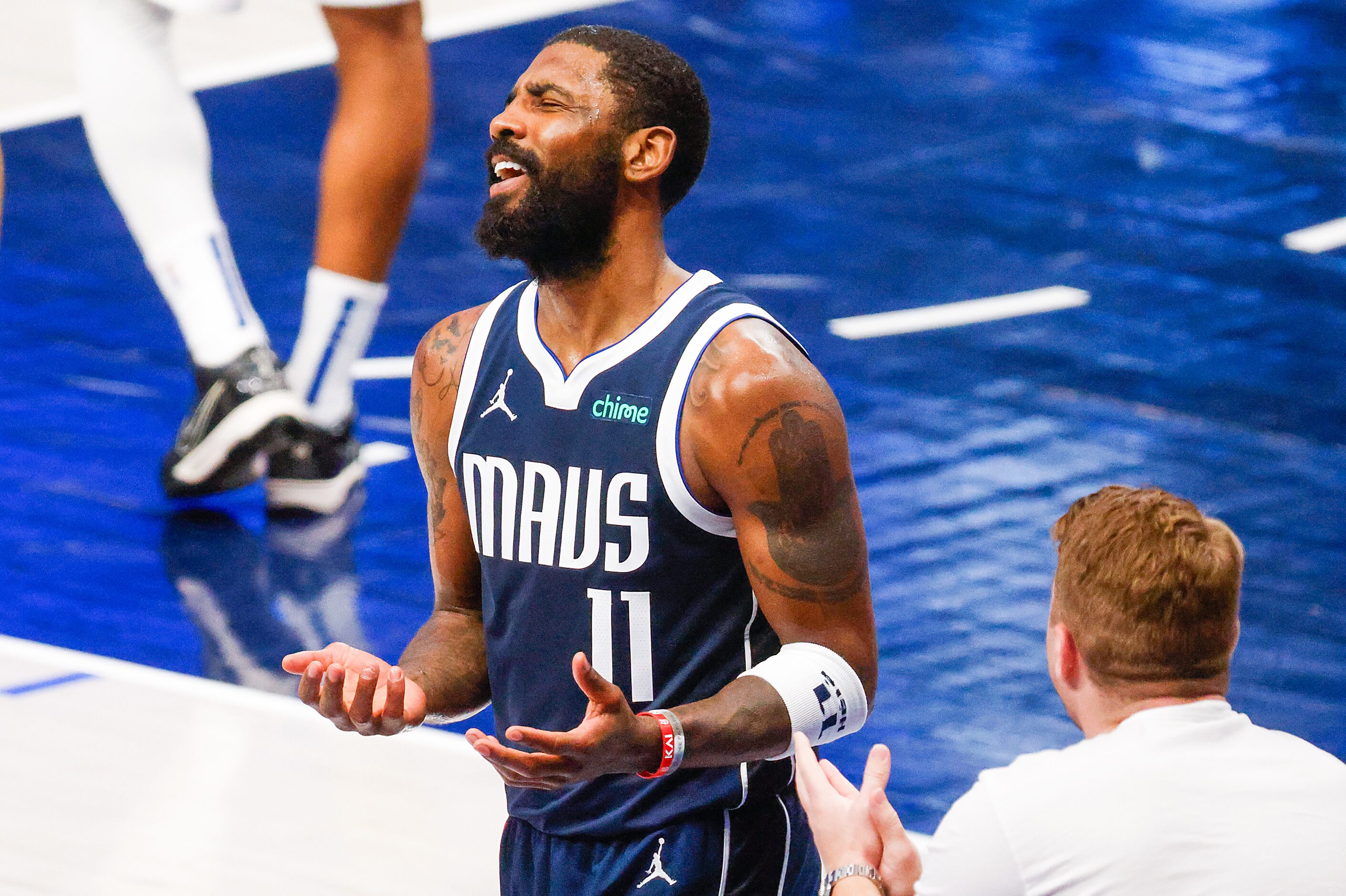 Dallas Mavericks guard Kyrie Irving reacts after a foul call against the LA Clippers during...