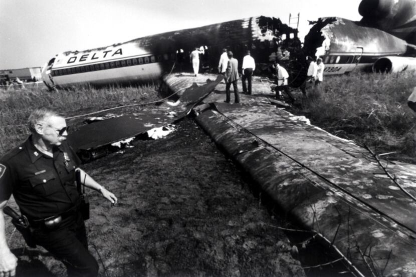 Inspectors  viewed  the  wreckage of Delta Flight No. 1141 at Dallas/Fort Worth...