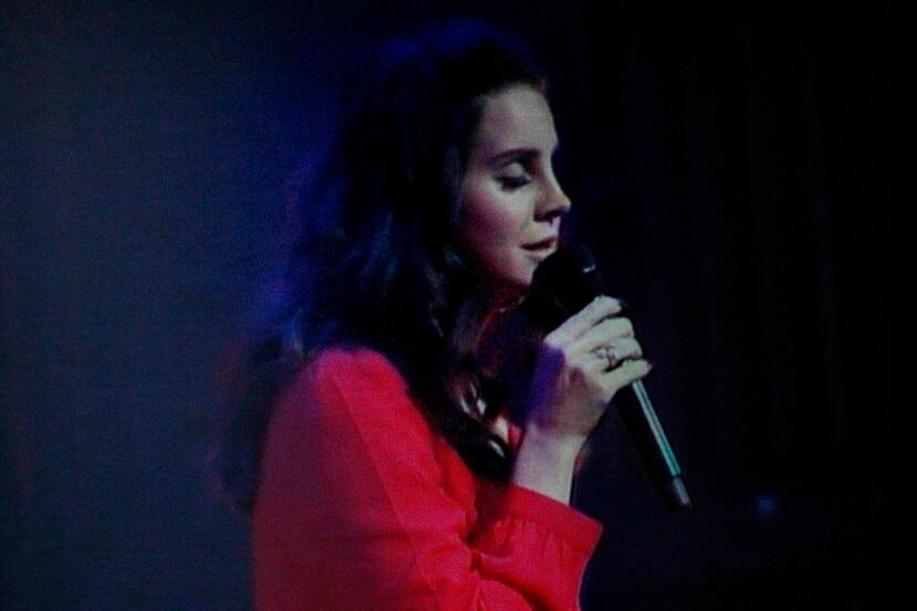 Big screen TVs depicted close up images of Lana Del Rey as she performed Wednesday night,...