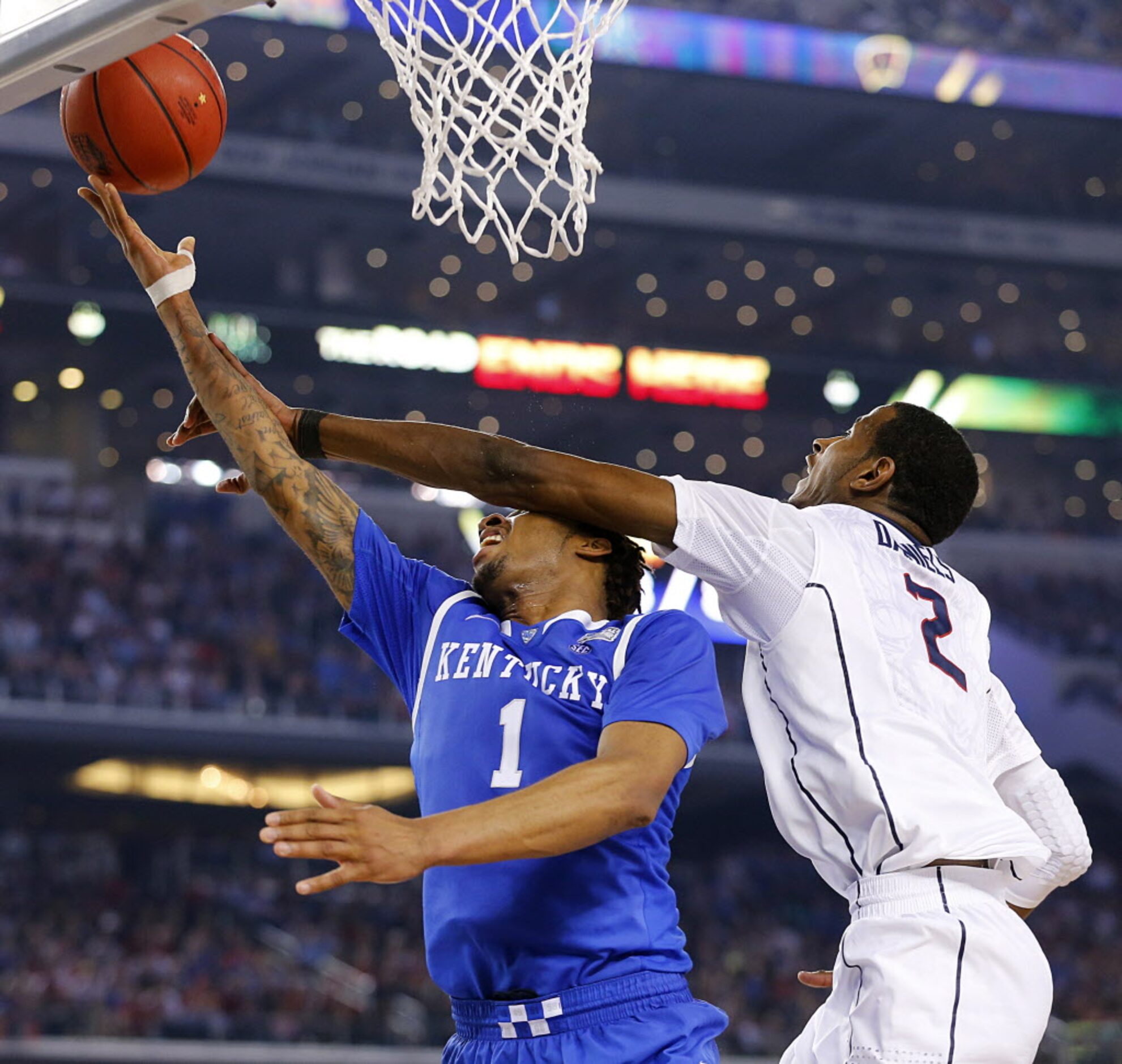 Connecticut Huskies forward DeAndre Daniels (2)  hammers Kentucky Wildcats guard/forward...