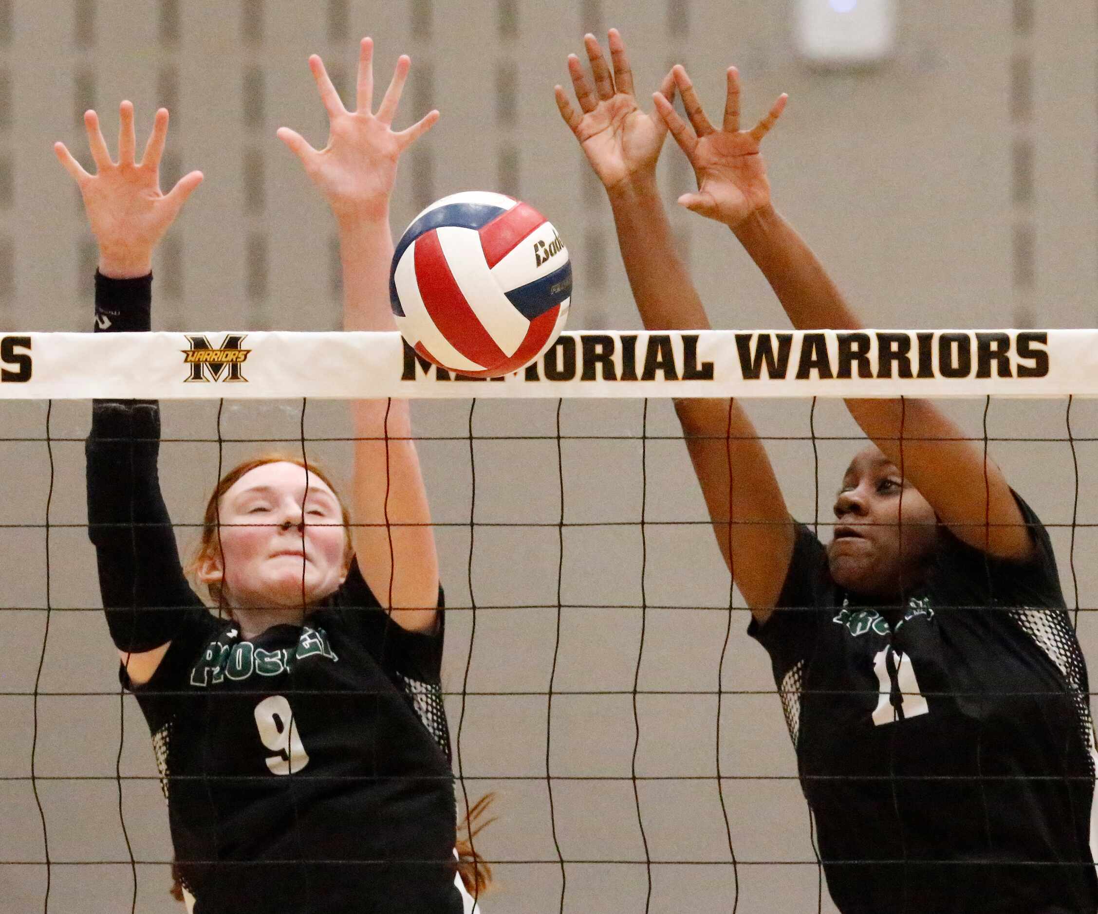 Prosper High School middle hitter Ella Chaney (9) and Prosper High School middle hitter...