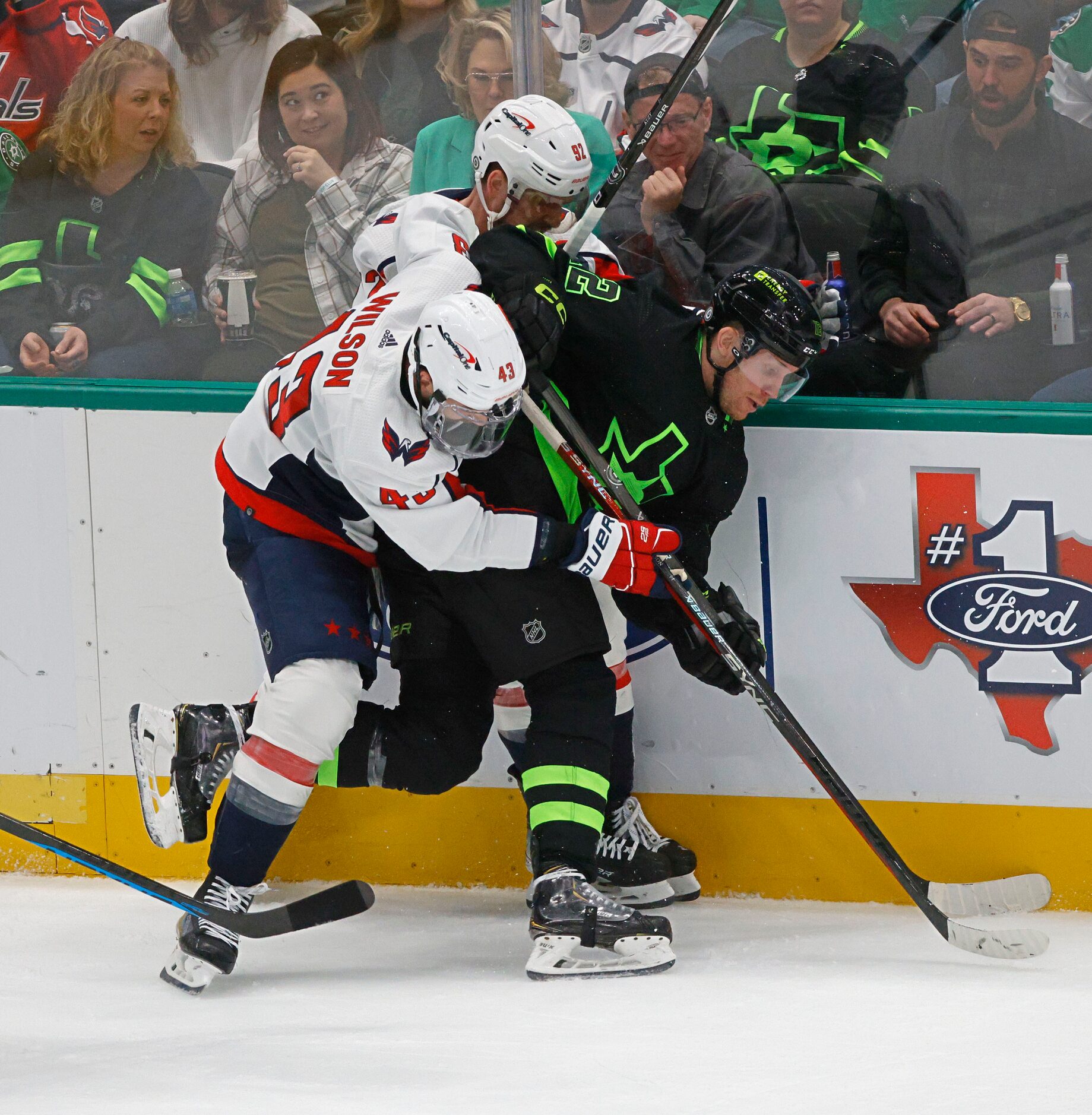 Dallas Stars center Radek Faksa (12) compete for the puck with \292\ and Washington Capitals...