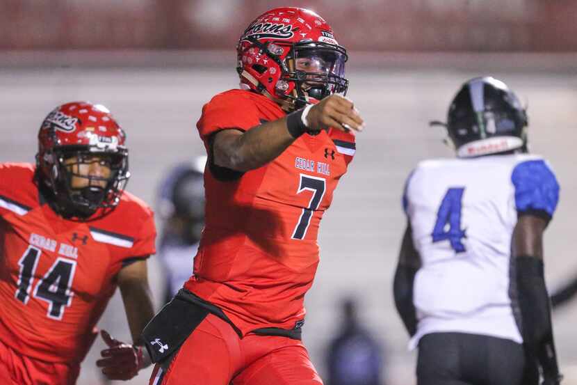 Cedar Hill quarterback Kaidon Salter (7) celebrates his touchdown during the first half of a...