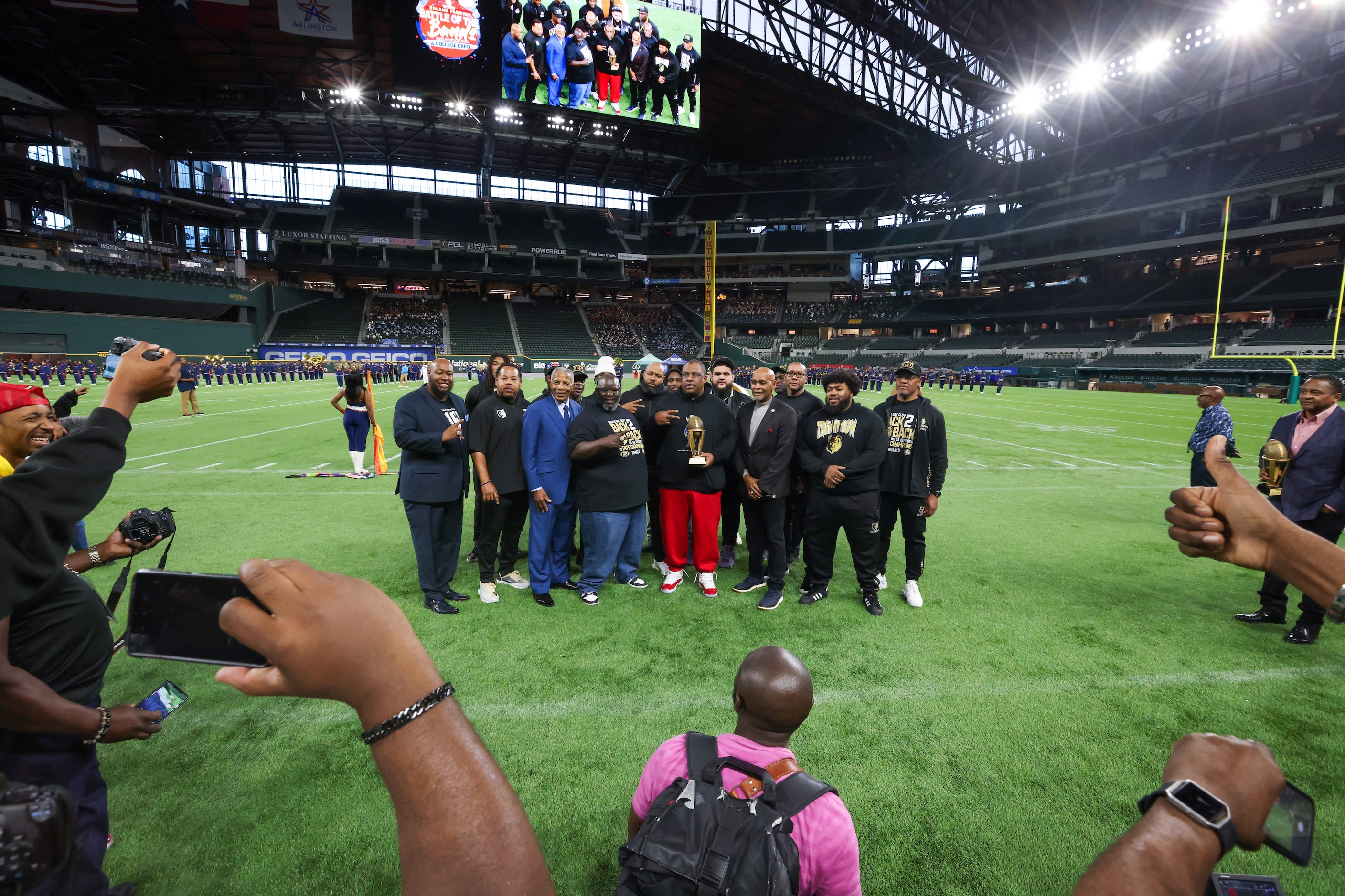 The South Oak Cliff coaching staff poses for a photo after being recognized for their state...