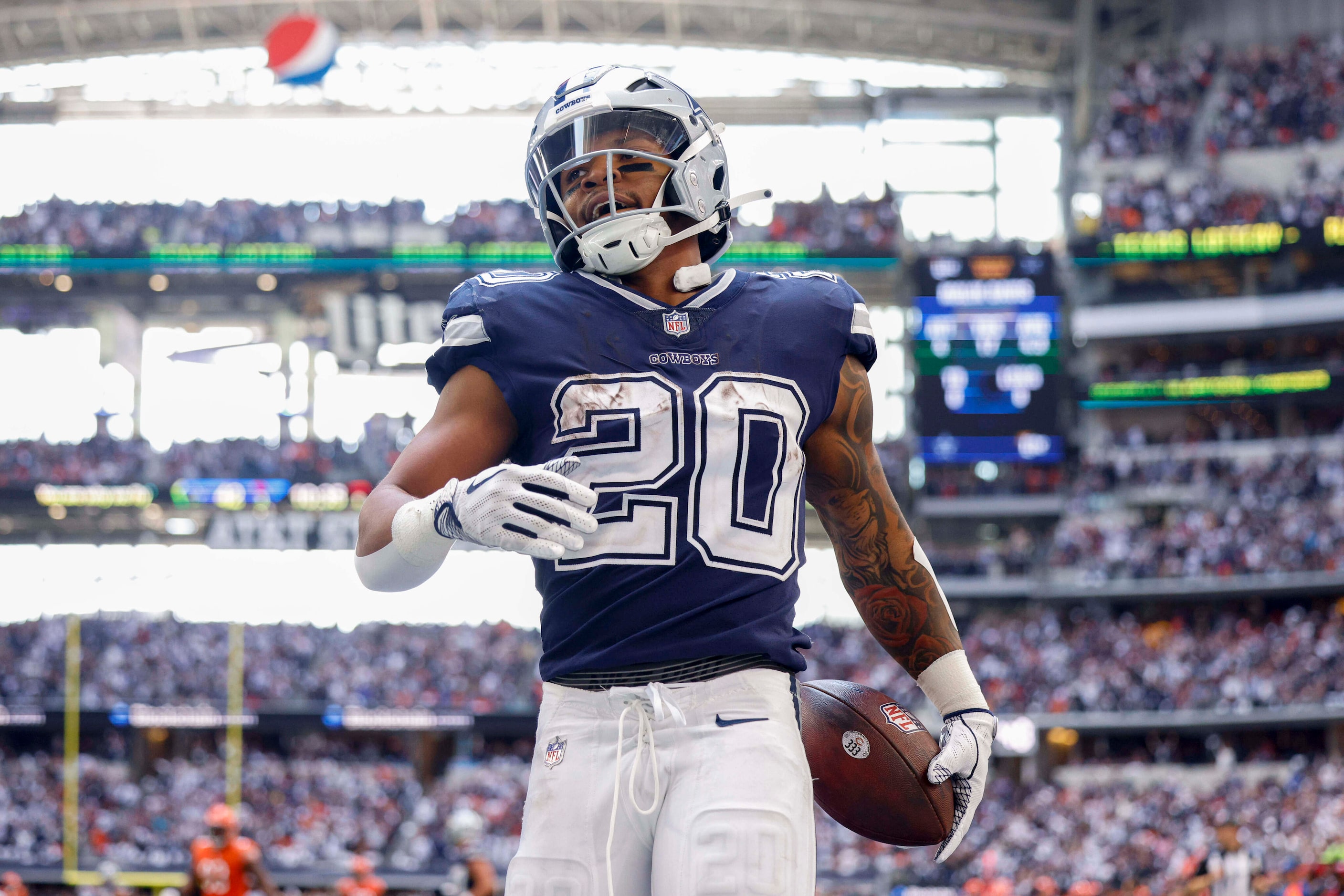 Dallas Cowboys running back Tony Pollard (20) celebrates a 54 yard touchdown during the...