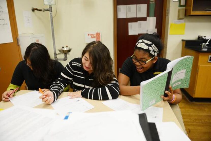 
Eighth grade science students (from left) Jacqueline Aguilar, Dioscelina Chavez and Morgan...