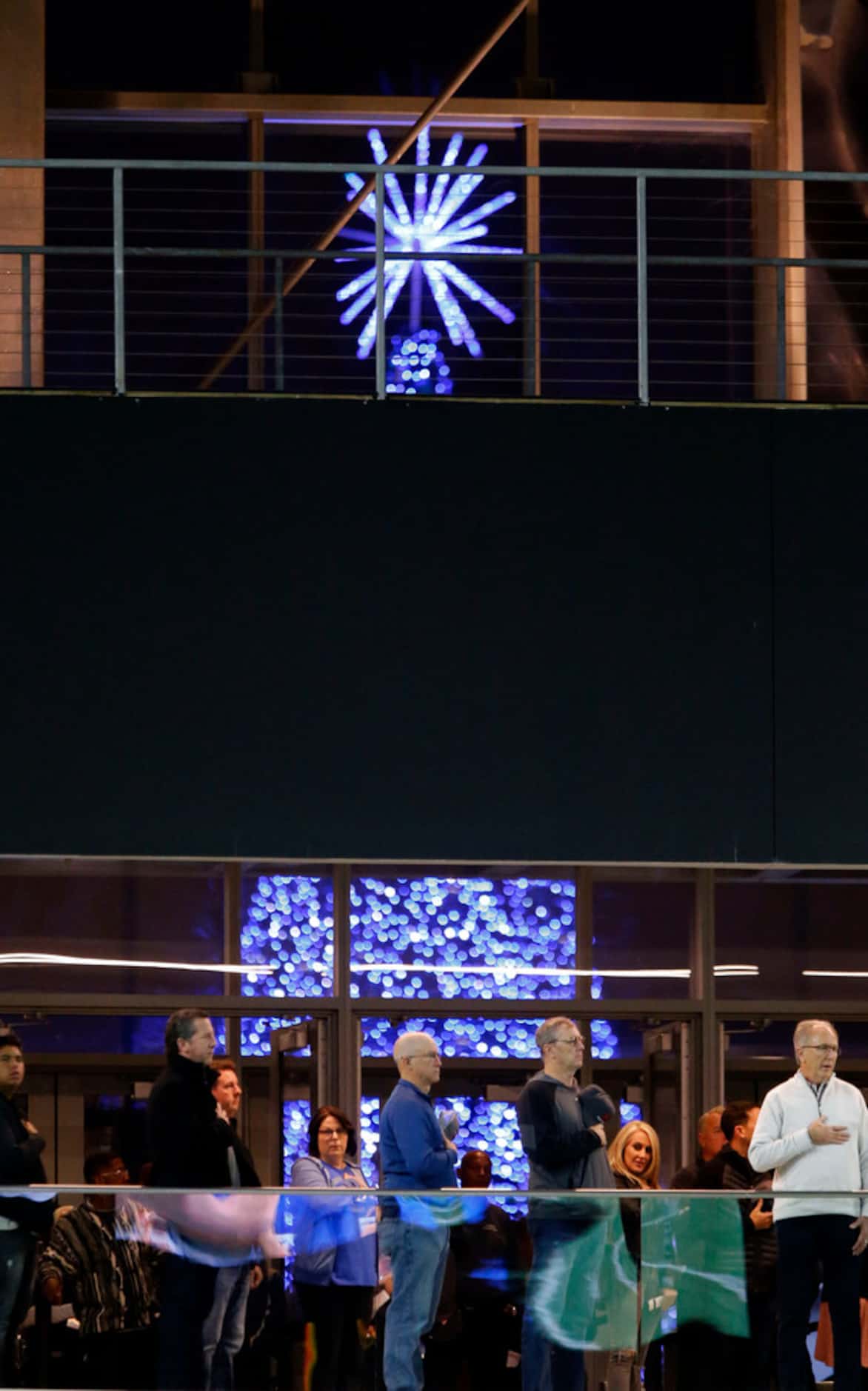 The Star Centre's giant Christmas tree can be seen through the Ford Center's window, as fans...