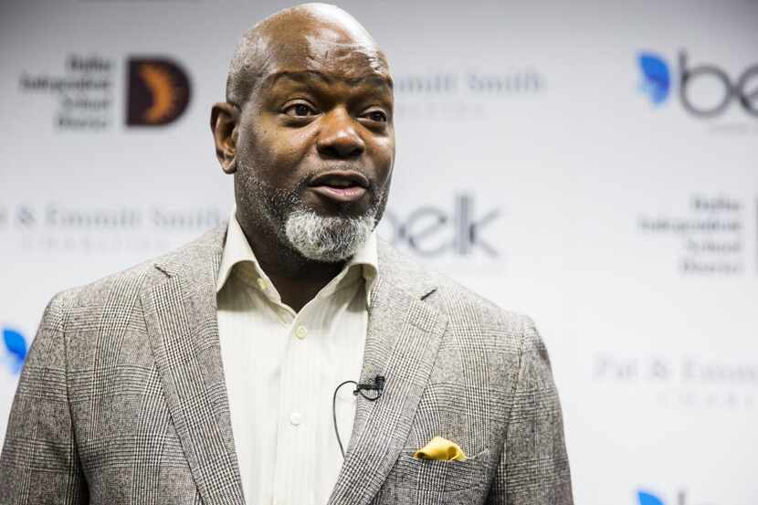 Emmitt Smith answers questions from the media during an event hosted by Pat & Emmitt Smith...