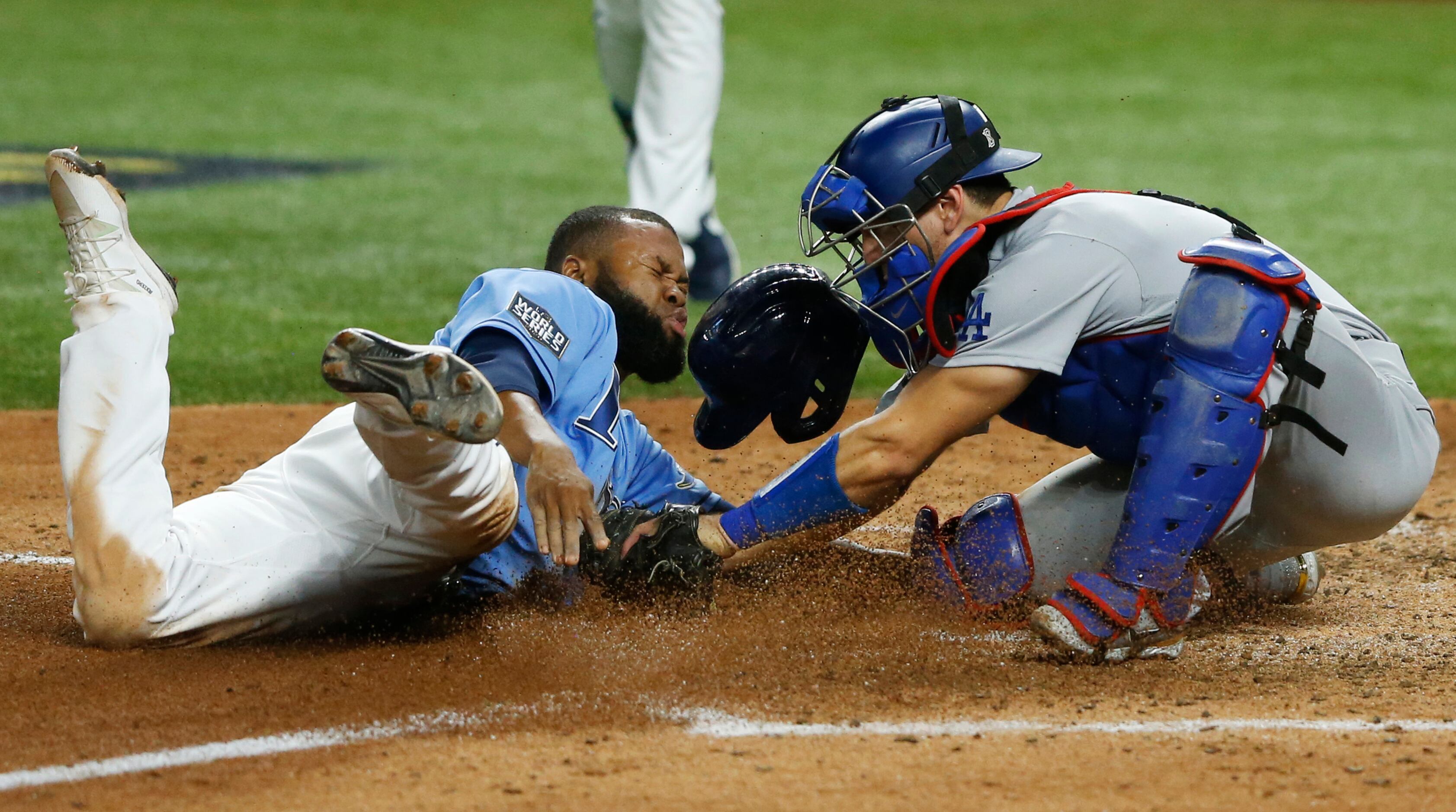 Los Angeles Dodgers' Mookie Betts steals second past Tampa Bay Rays  shortstop Willy Adames during the sixth inning in Game 3 of the baseball World  Series Friday, Oct. 23, 2020, in Arlington