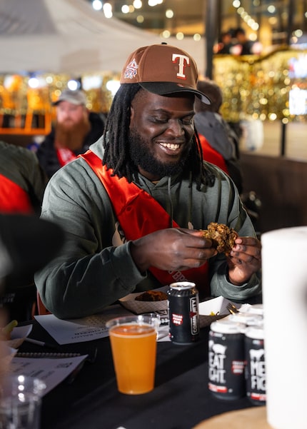 Goldee's Barbecue co-founder Jalen Heard samples food at a previous Meat Fight. He's a judge...