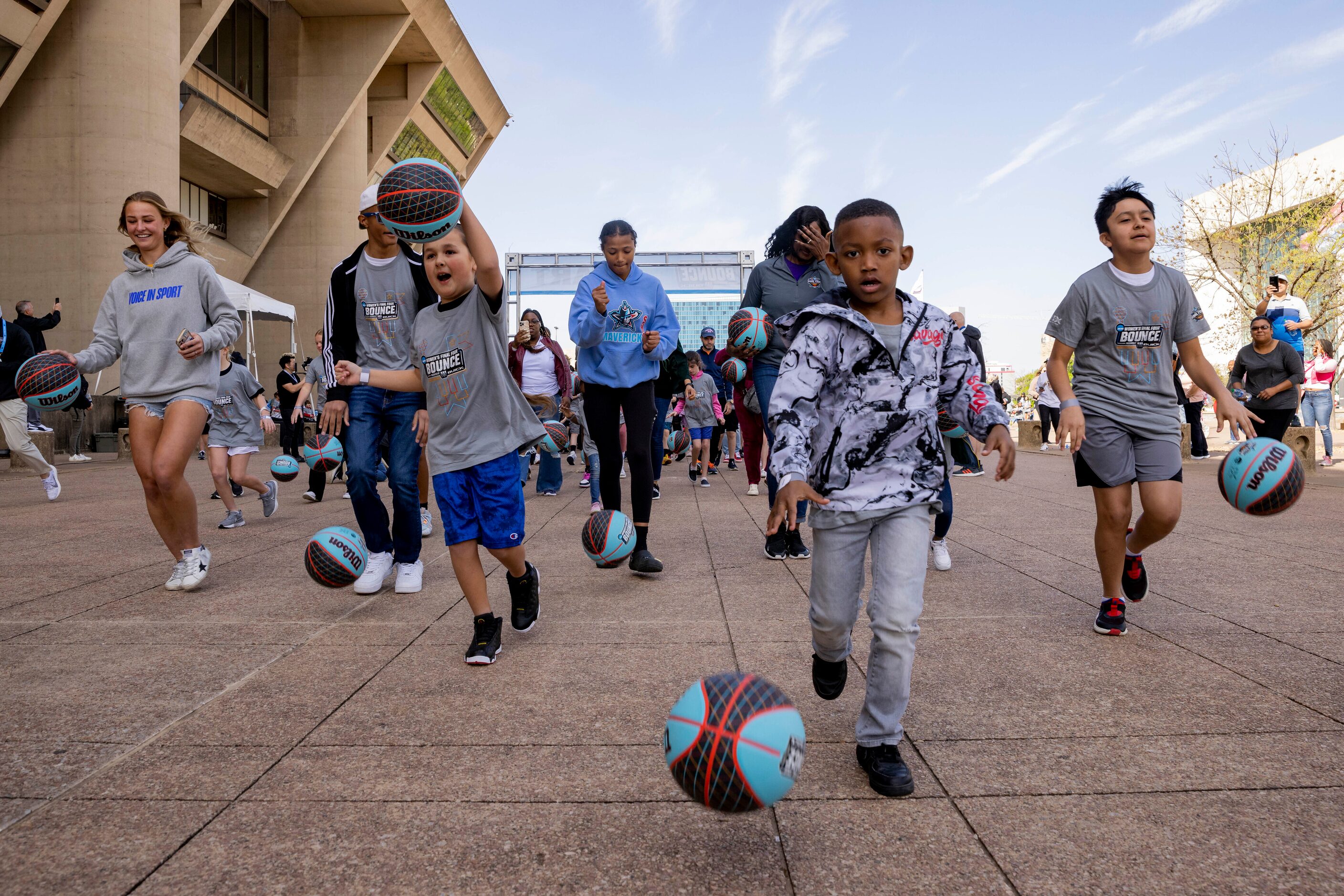 Fans take off from the starting line as they make their way from City Hall to Tourney Town...