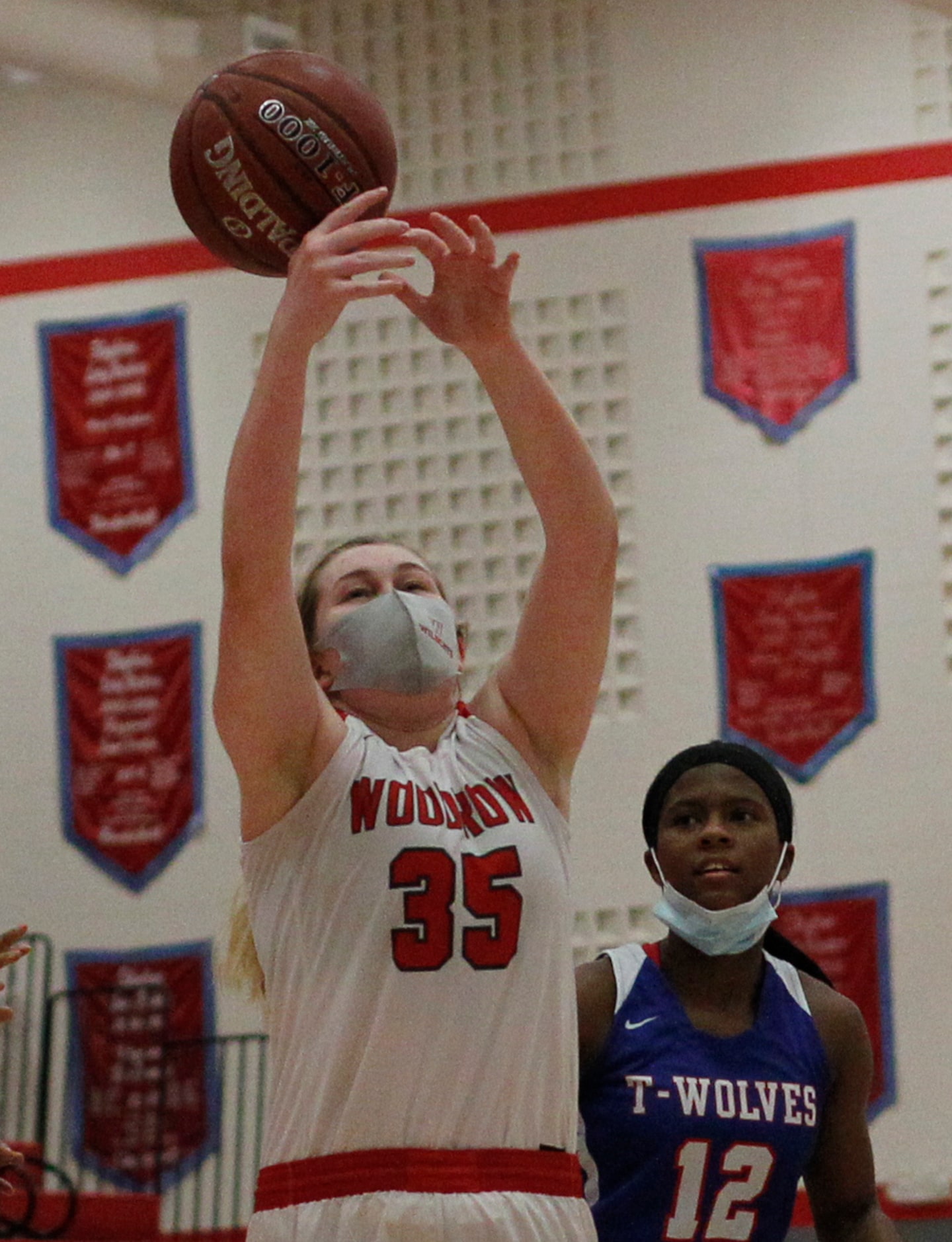 Dallas Woodrow Wilson's Allison King (35) reaches but is unable to pull in a tall pass...