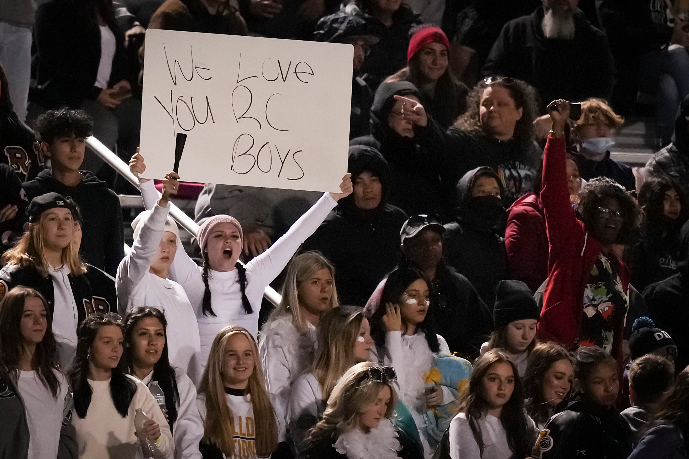 Royce City students cheer their team during the second quarter of a District 8-5A Division...