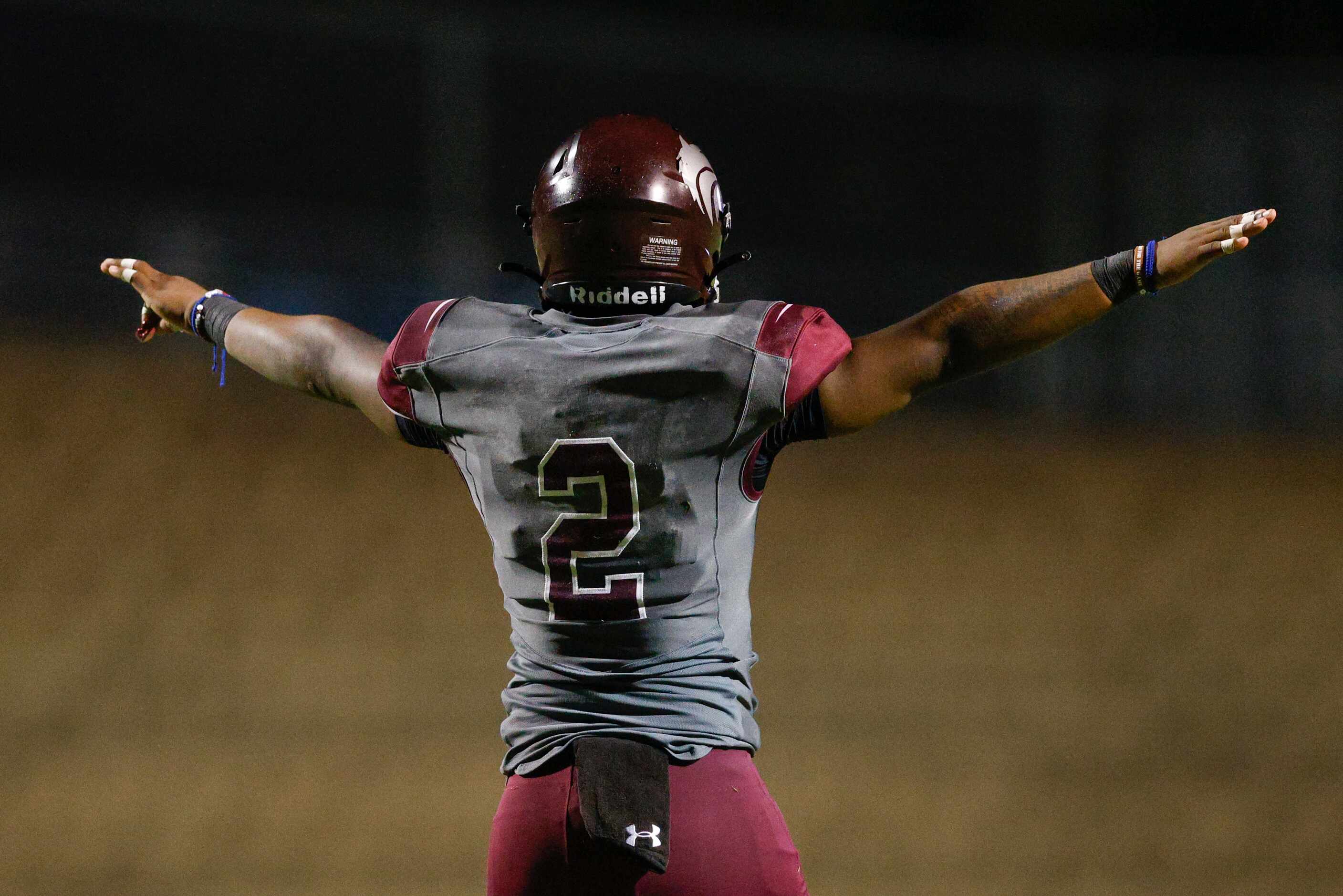 Mansfield Timberview linebacker Joel Ardern (2) celebrates an incompletion during the second...