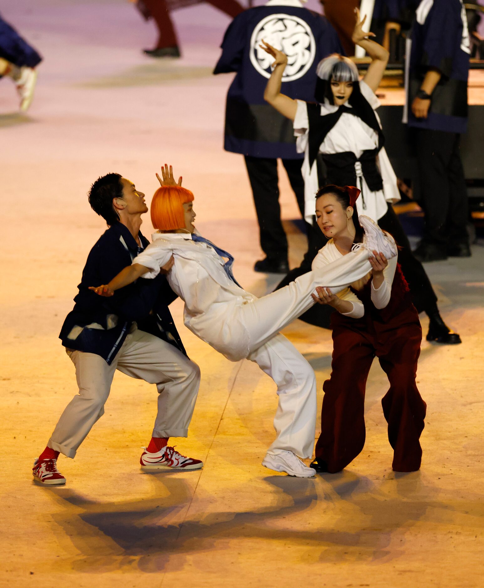 Dancers performs during the opening ceremony for the postponed 2020 Tokyo Olympics at...