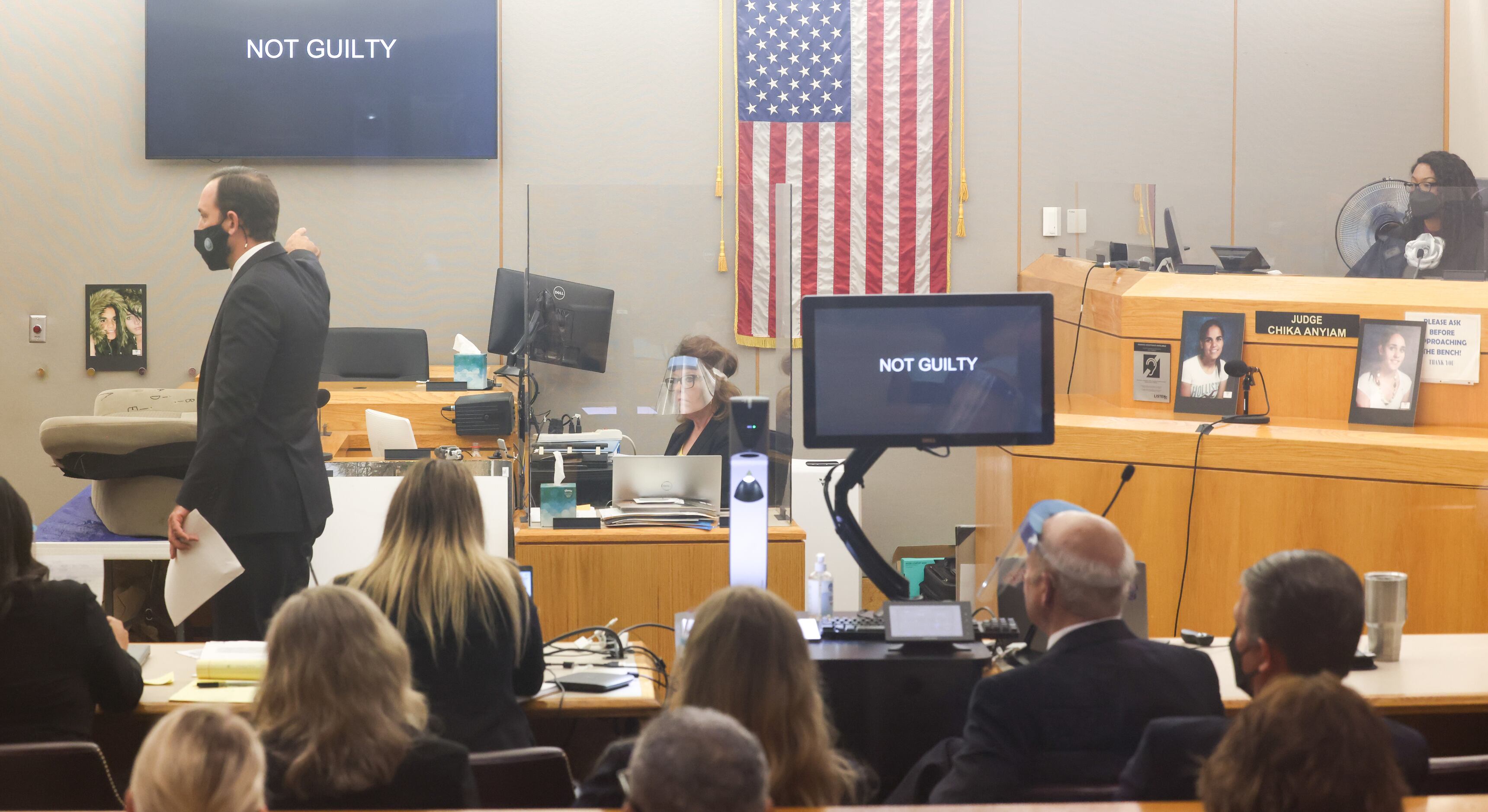 Defense lawyer Joseph Patton points to the screen as he gives closing remarks in the trial...