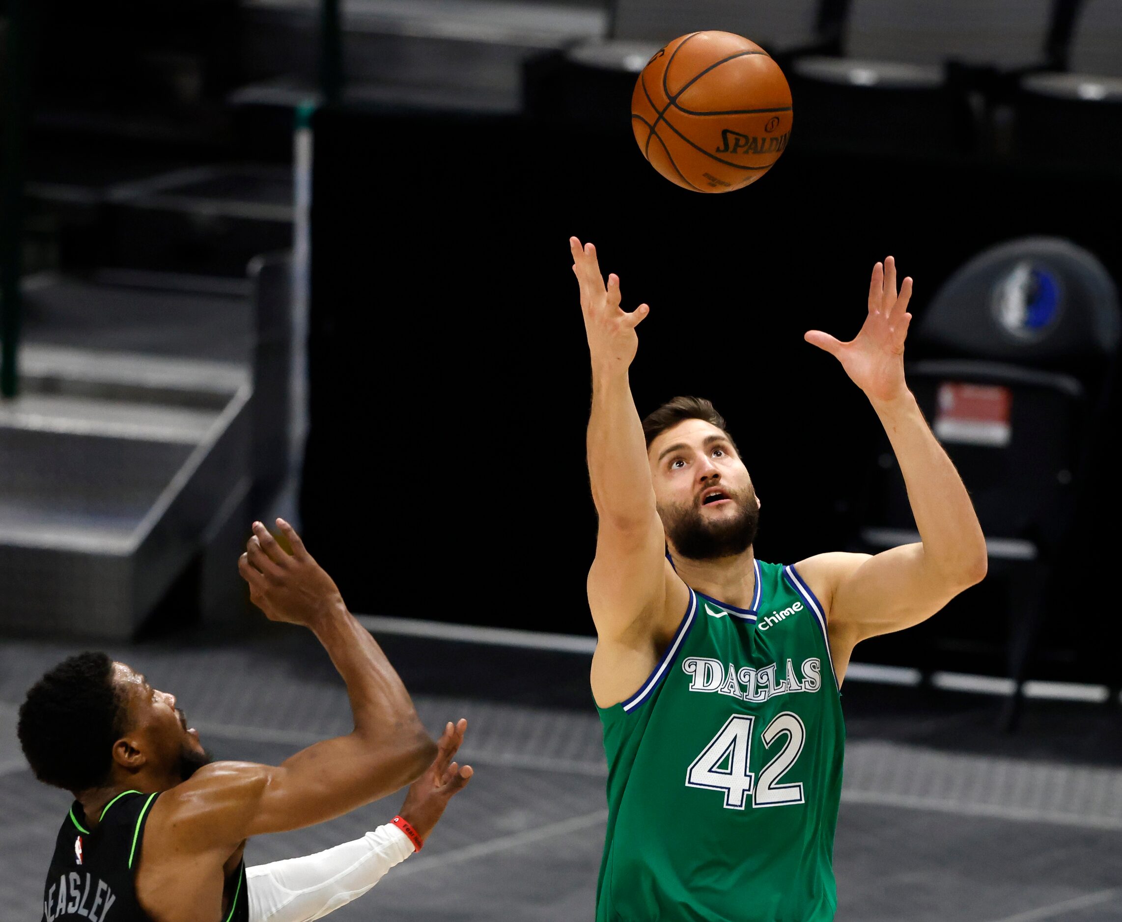 Dallas Mavericks forward Maxi Kleber (42)prepares to catch the ball as Minnesota...