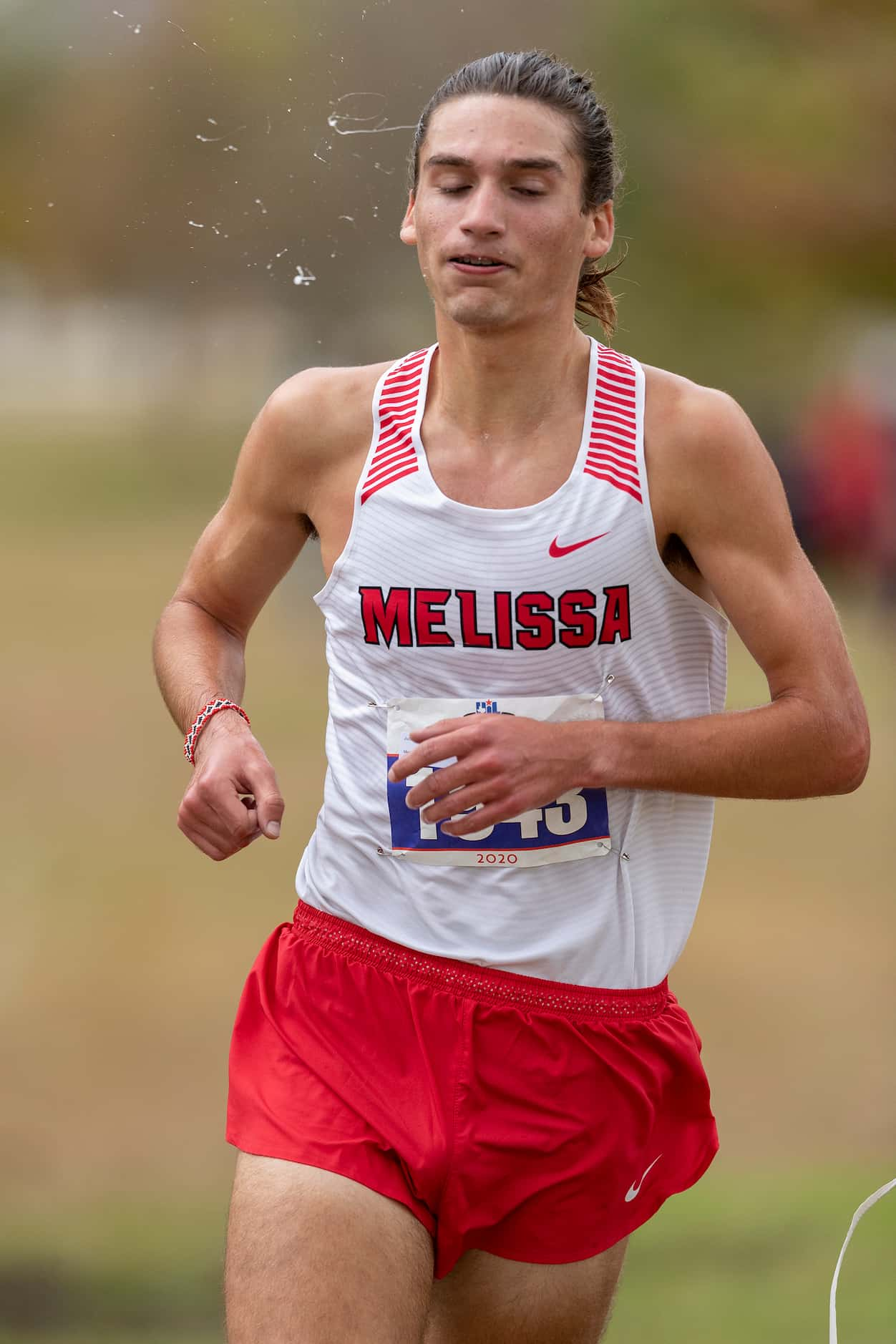 Melissa's Judson Greer (1943) finishes first in the boys UIL Class 4A state cross country...