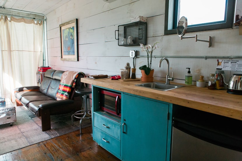 The rooms at Flophouze Hotel in Round Top include kitchen and living areas. 