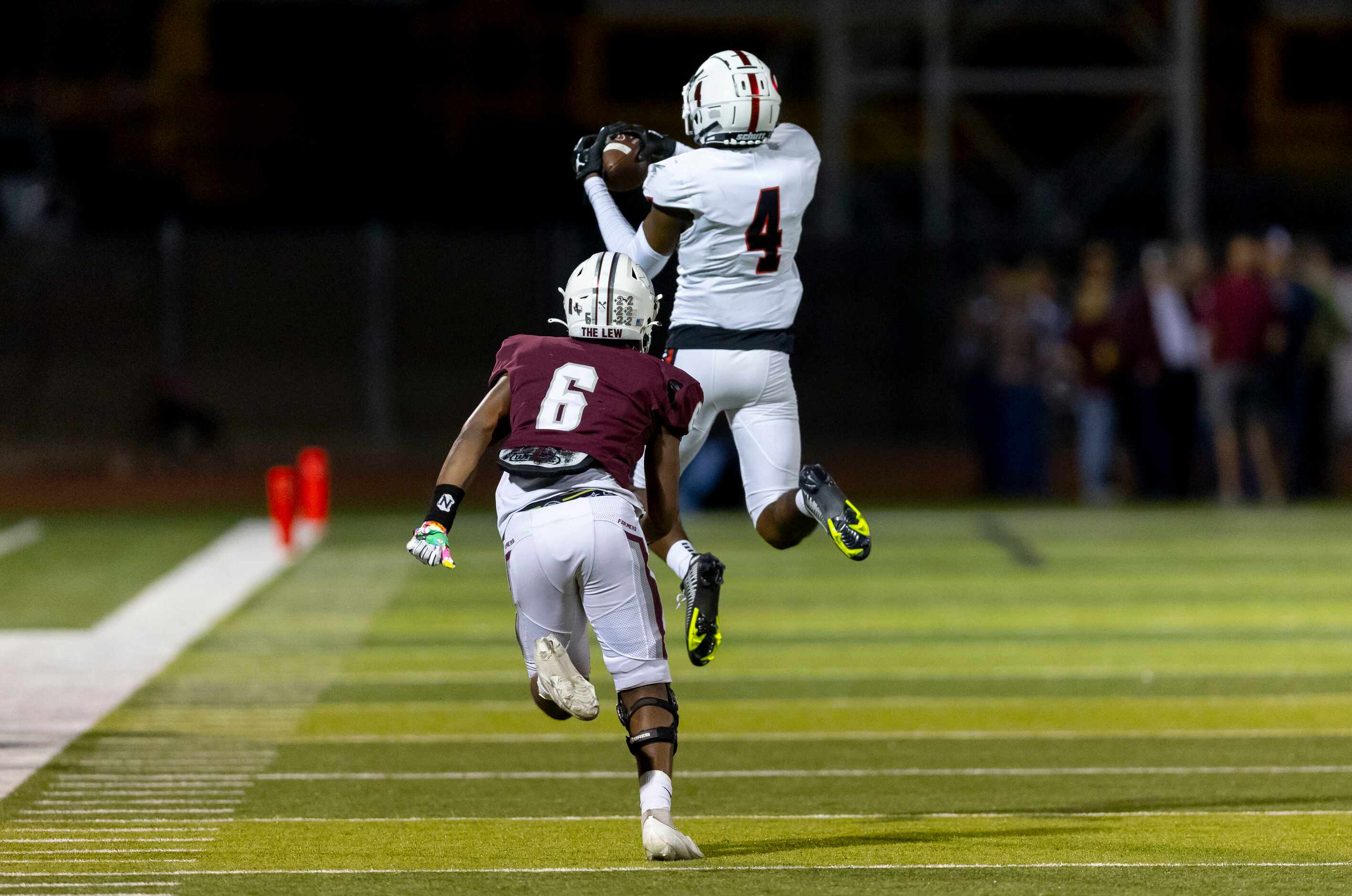 Coppell senior defensive back Braxton Myers (4) intercepts a pass intended for Lewisville...
