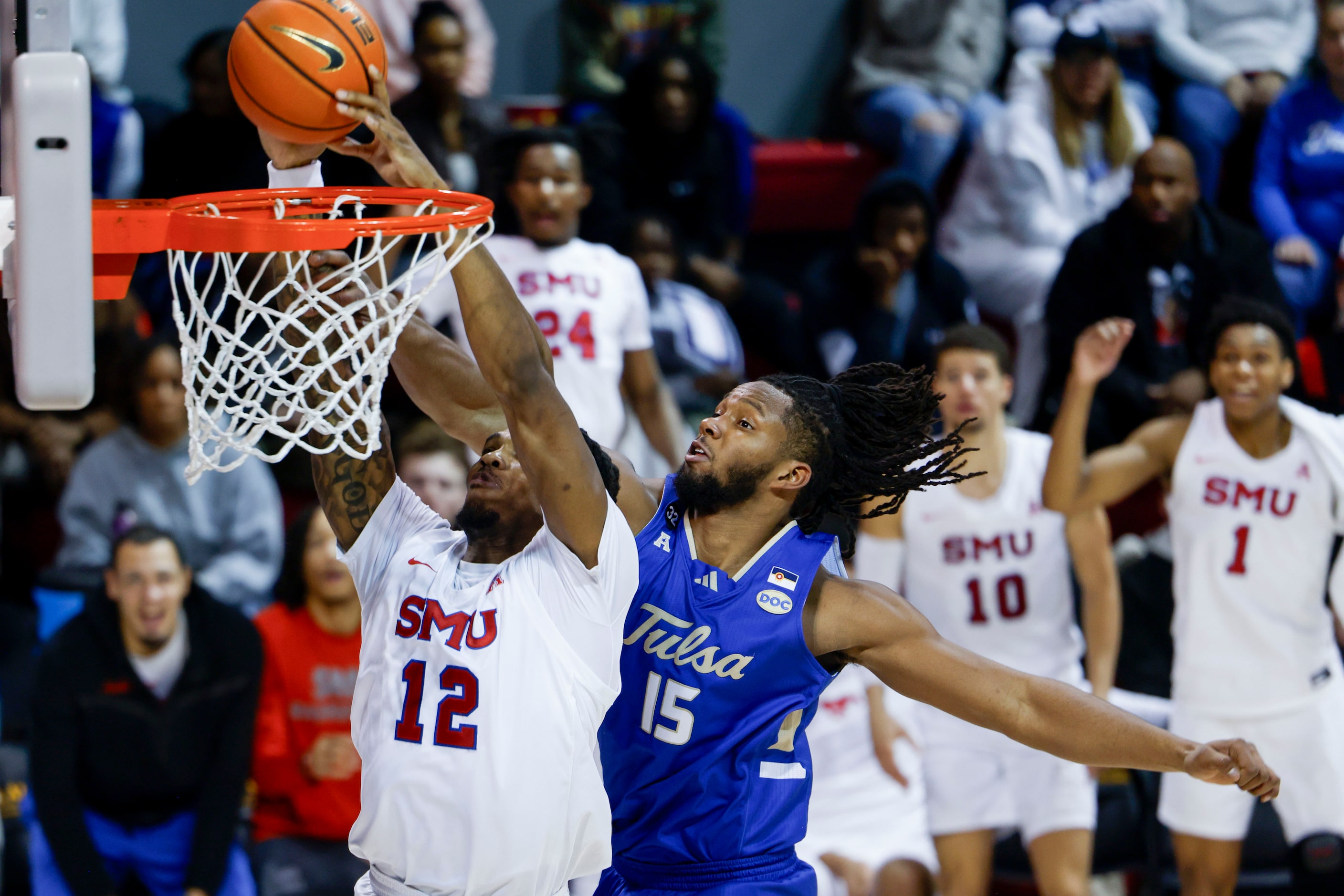 Southern Methodist forward Tyreek Smith (12) attempts to dunk against Tulsa forward Jared...