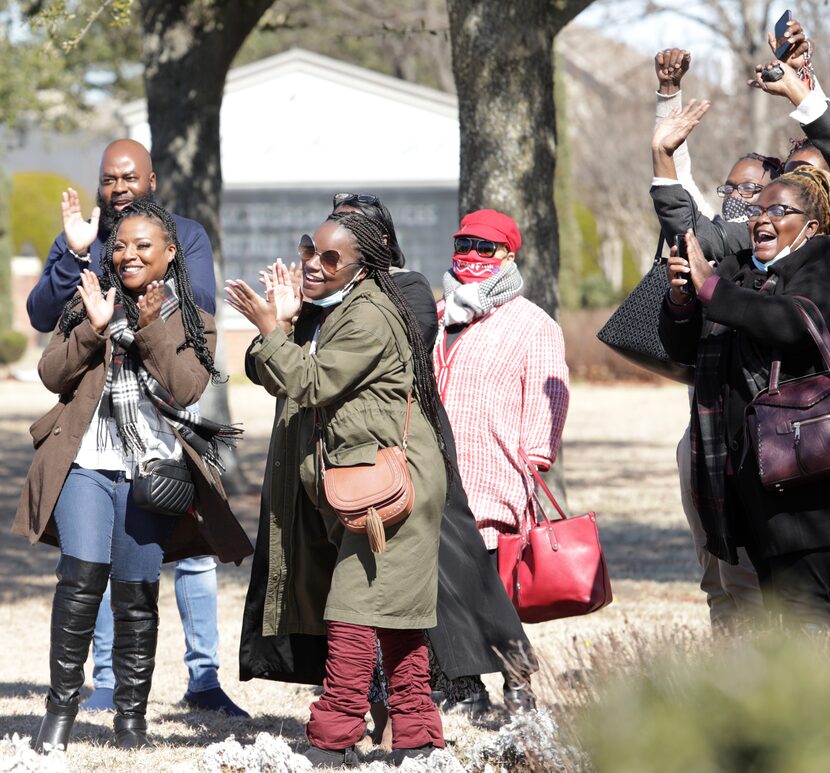 Community members celebrate the renaming of E. Kirnwood Dr. to Dr. KD Wesley Way during a...