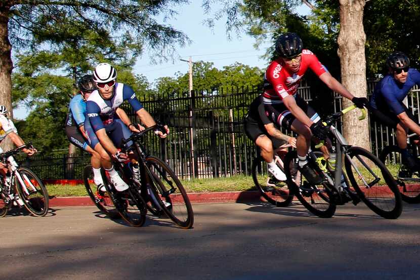 Cyclists compete during opening night for King Racing Group's cycling race season at Fair...
