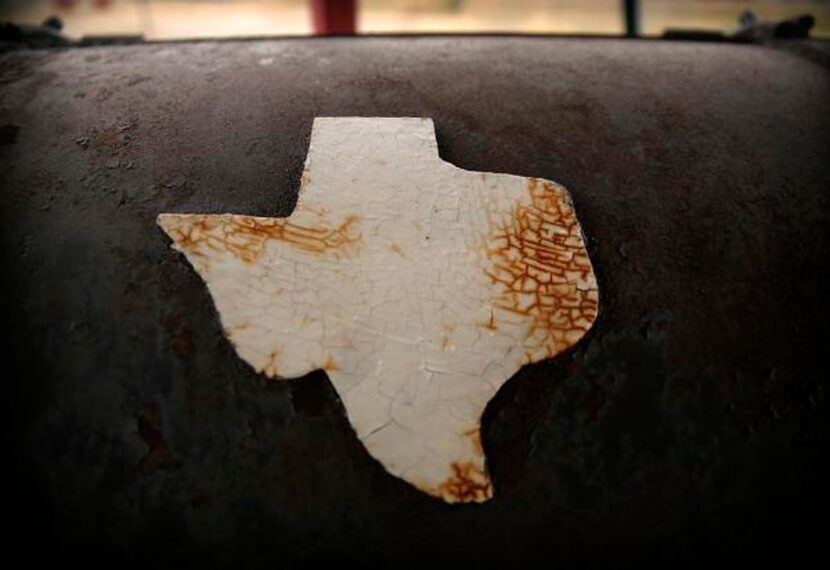 
Th smoke and heat have left their mark on pit boss Terry Massey's smoker at Lazy S&M BBQ.
