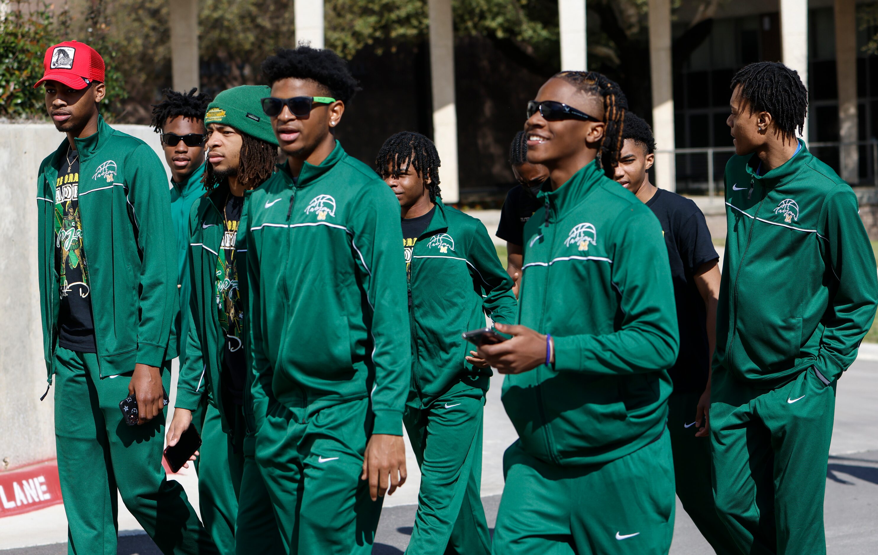 James Madison High School boys varsity basketball walks in the Parade of Champions,...