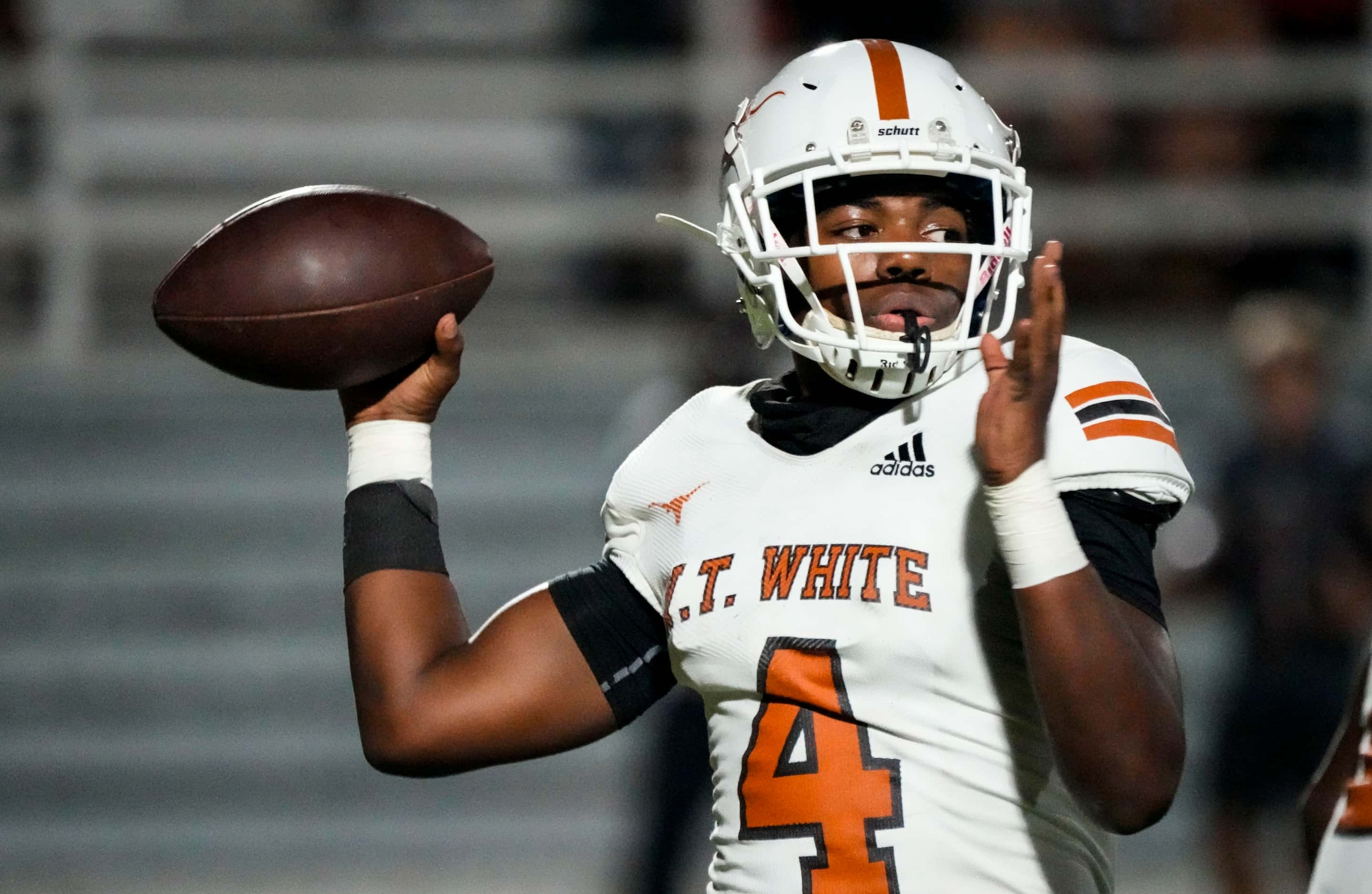 W.T. White quarterback Jayden Sisk (4) throws during the first half of a high school...