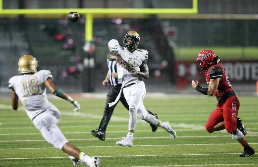 DeSoto's Tristen Wallace (5) passes the ball in a game against Cedar Hill during the first...