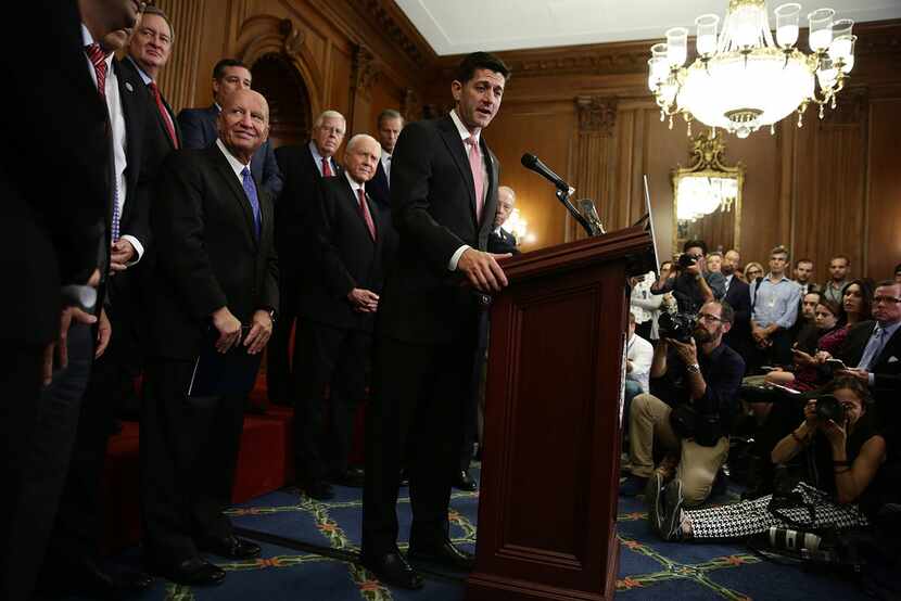 U.S. Speaker of the House Rep. Paul Ryan (R-WI) speaks as other congressional Republicans...