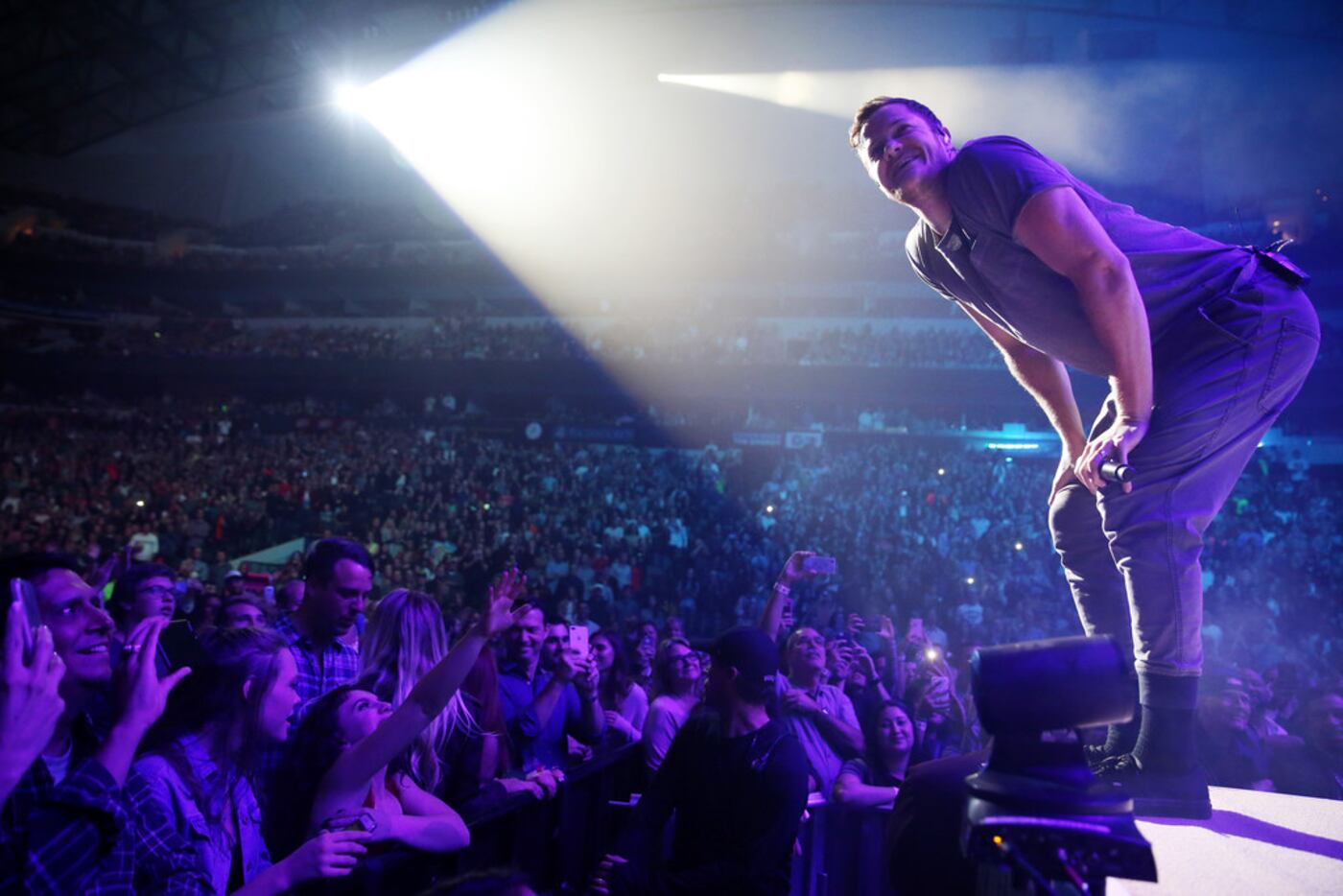 Dan Reynolds of Imagine Dragons perform at the American Airlines Center in Dallas Monday...