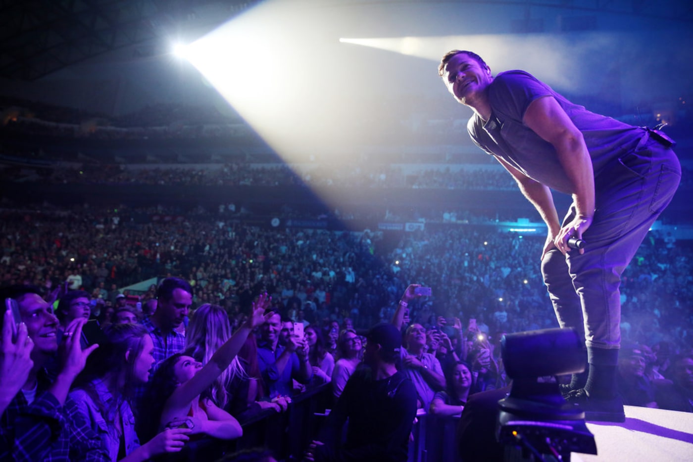 Dan Reynolds of Imagine Dragons perform at the American Airlines Center in Dallas Monday...