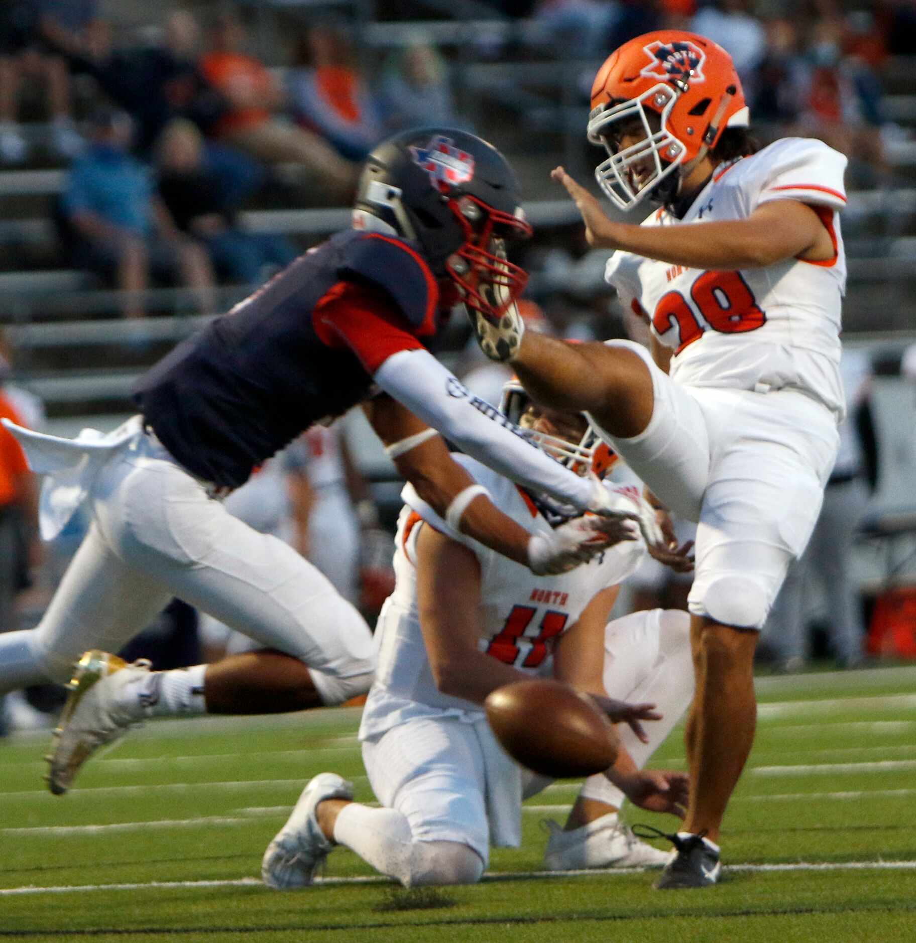 Northwest defensive back Isaac Bohls (3) dives to block the extra point attempt by McKinney...