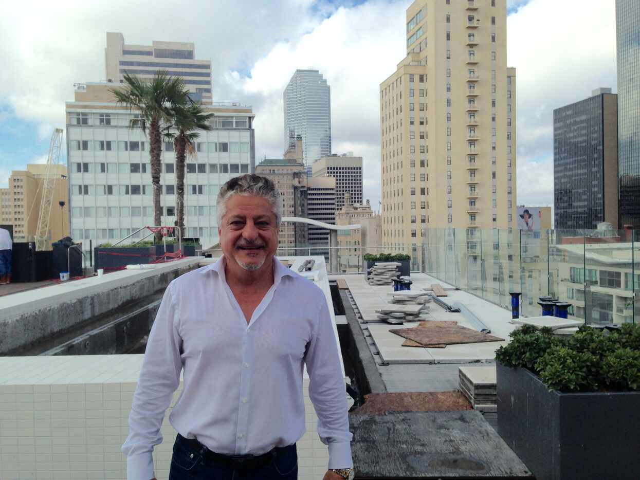 Developer Mehrdad Moayedi at the rooftop pool at the Statler Hotel.