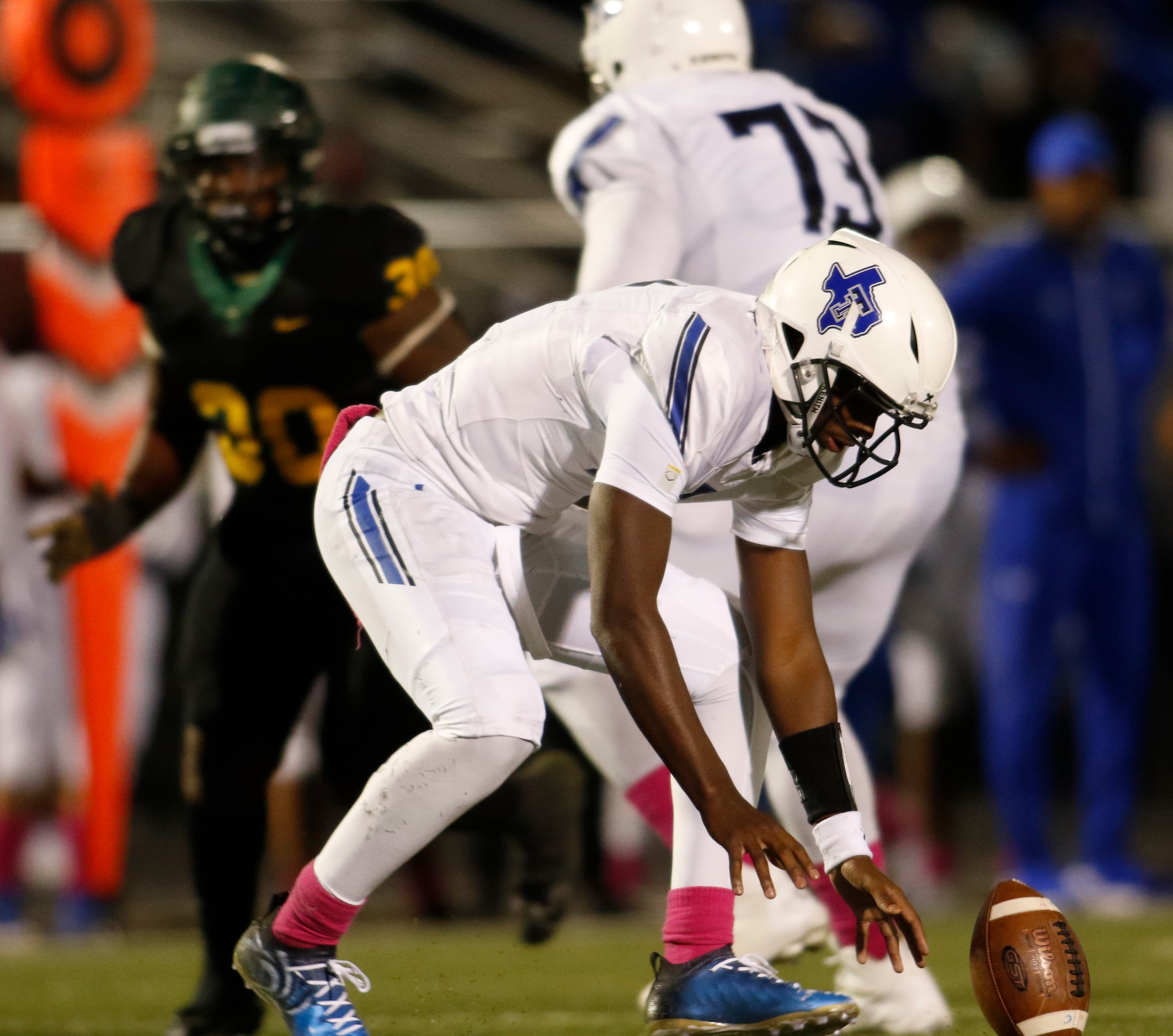 Trinity Christian Cedar Hill quarterback Shedeur Sanders  (2) reaches to recover a fumbled...