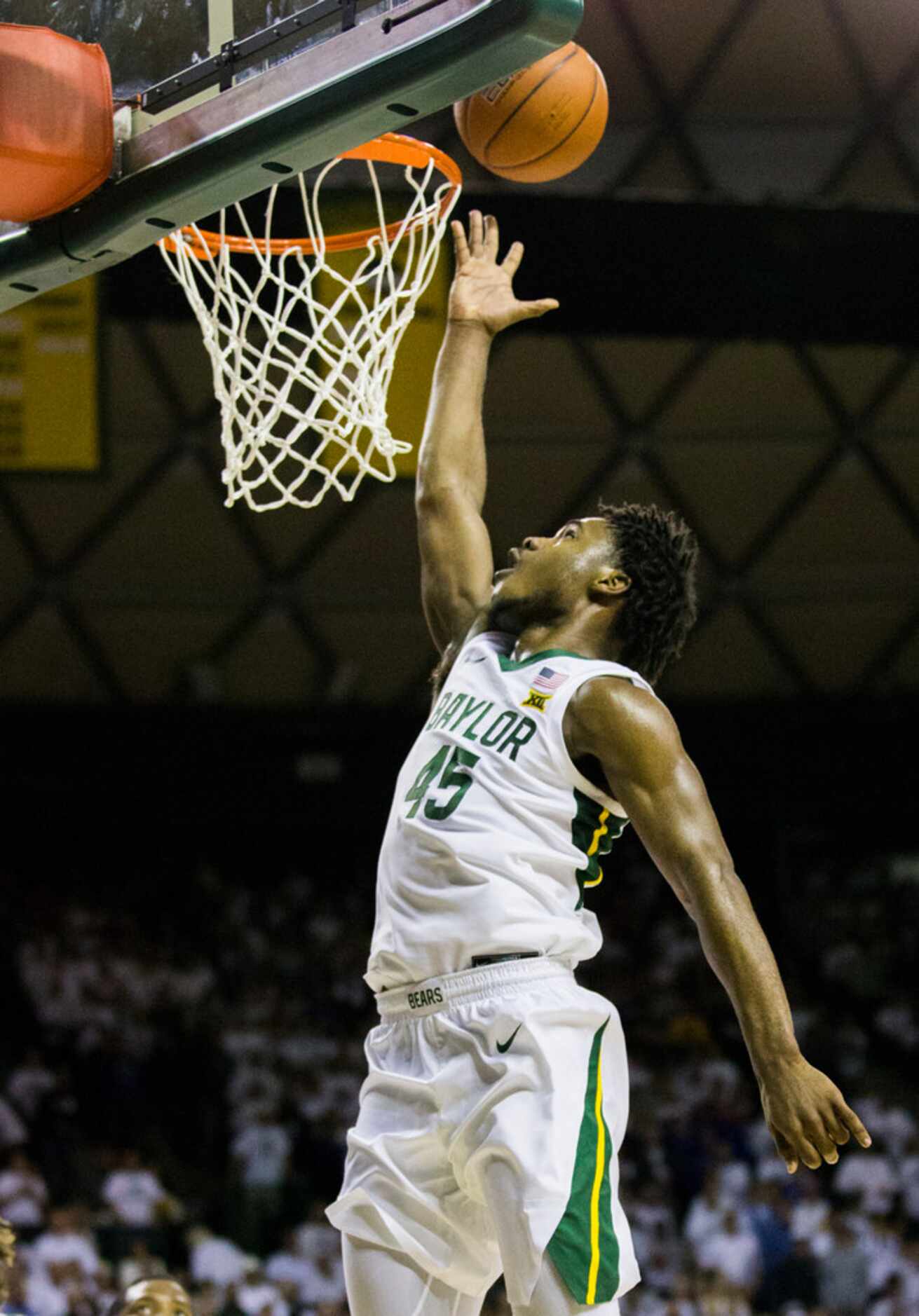 Baylor Bears guard Davion Mitchell (45) takes a shot at the hoop during the first half of an...