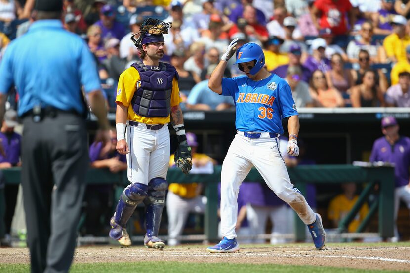 Florida's Wyatt Langford (36) crosses the plate on his 3-run homer during the sixth inning...