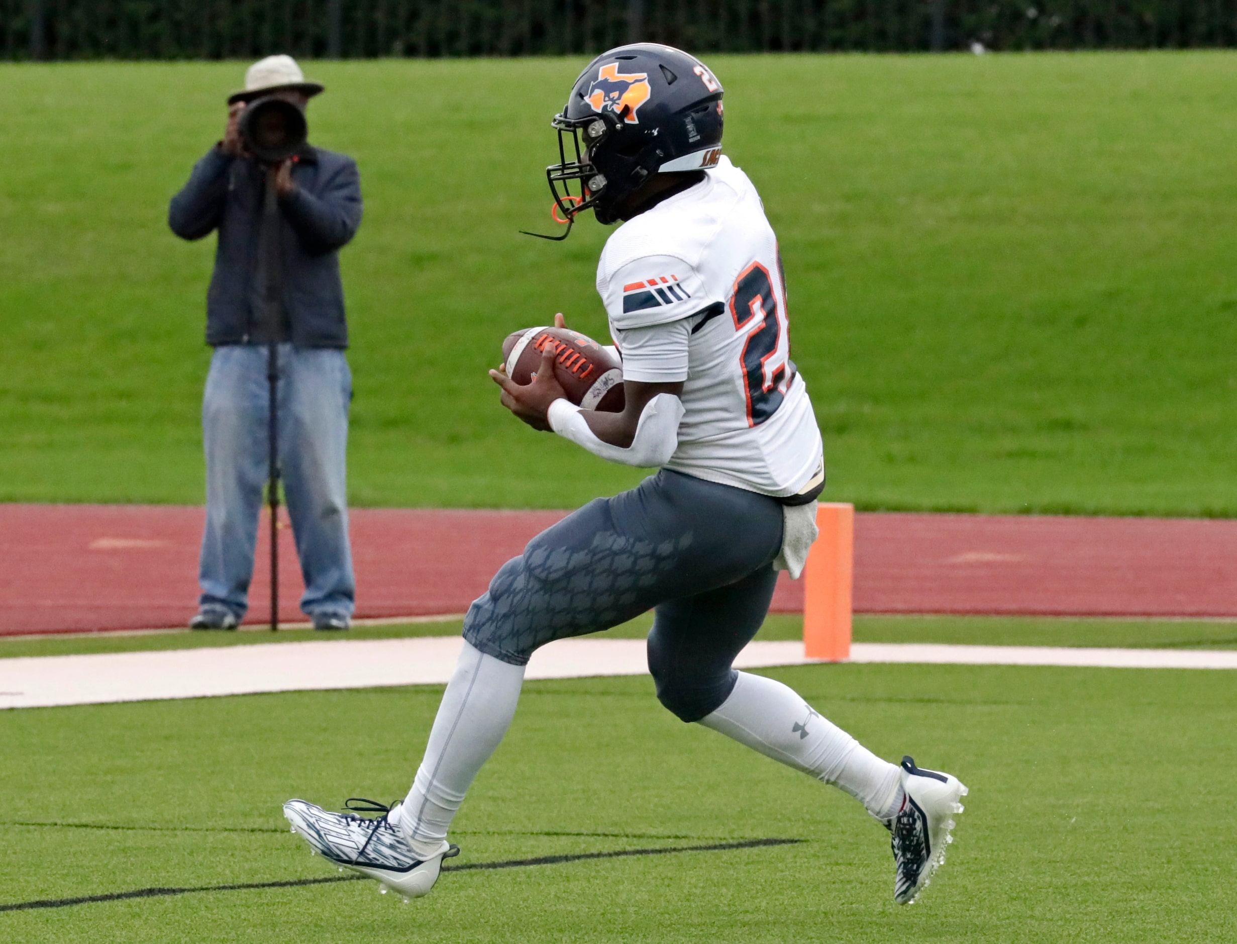 Sachse High School running back Brendon Haygood (28) scores a touchdown during the first...