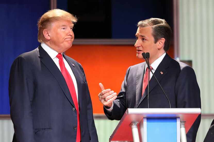  Republican presidential candidates Donald Trump and Sen. Ted Cruz speak during a commercial...