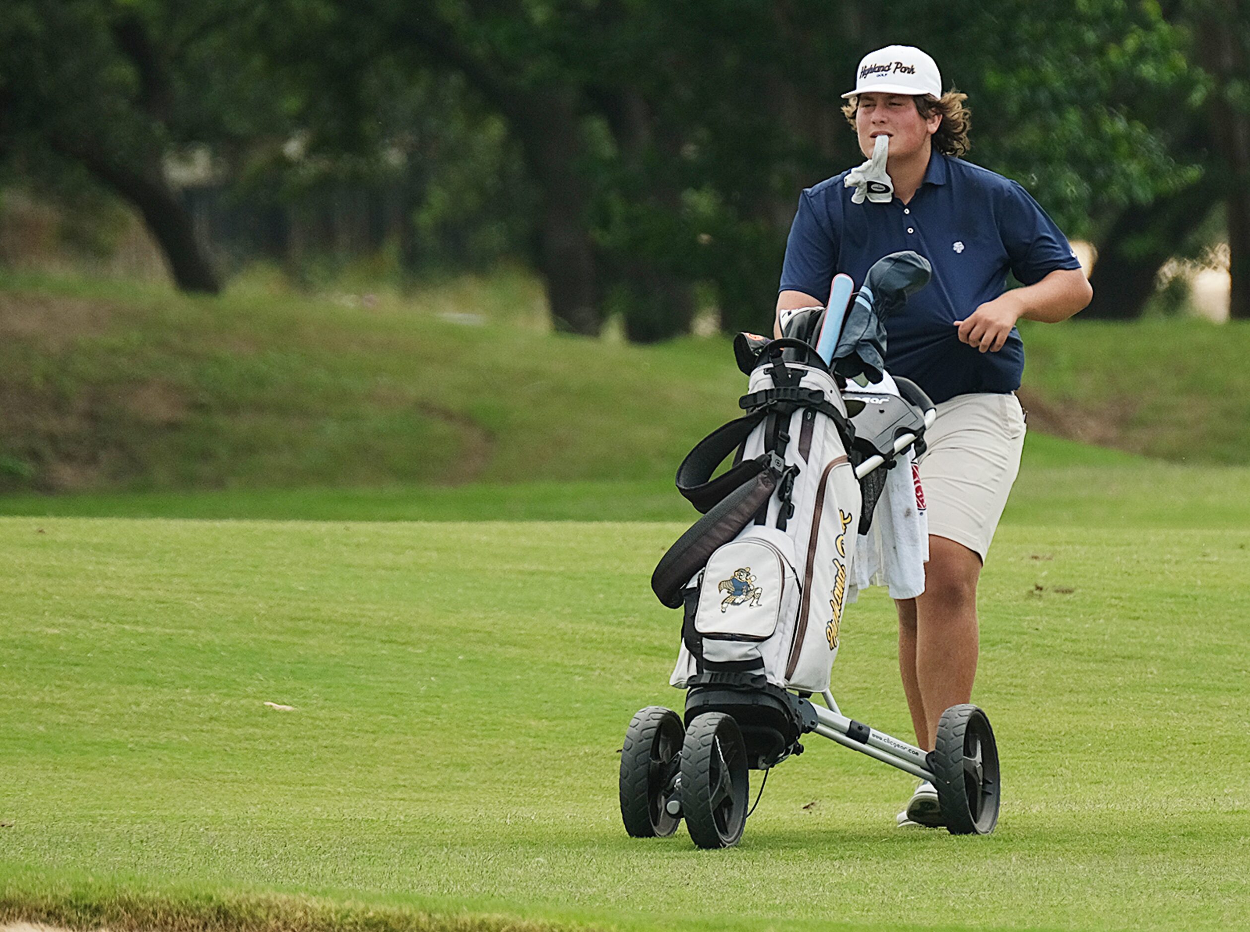 Brooks Simmons of Highland Park makes his way to the green during Day 2 of the UIL 6A boys...