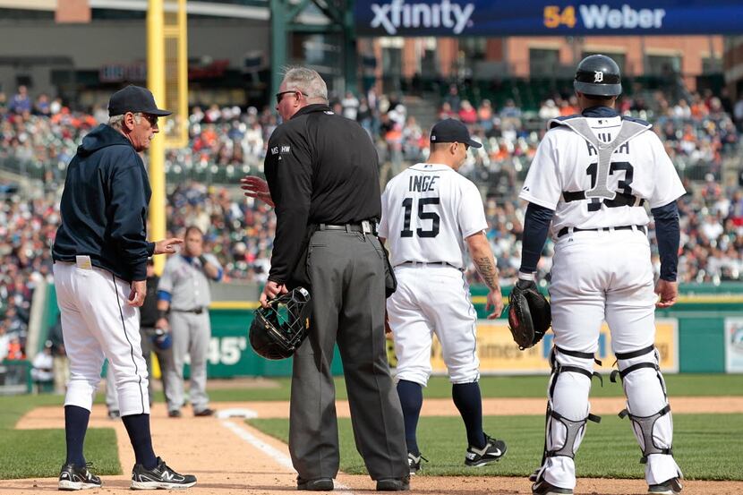 Detroit Tigers manager Jim Leyland #10 talks with home plate umpire Tim Welke in the...