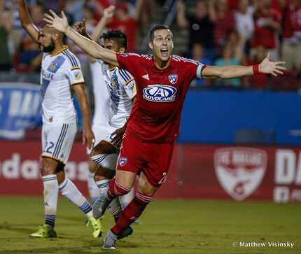 15 August 2015 - FC Dallas defender Matt Hedges (#24) celebrates after scoring what he...