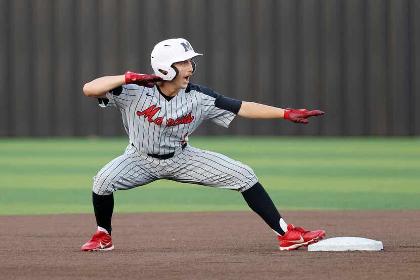 Flower Mound Marcus player Nick Mazzola celebrates a run-scoring double against Keller...