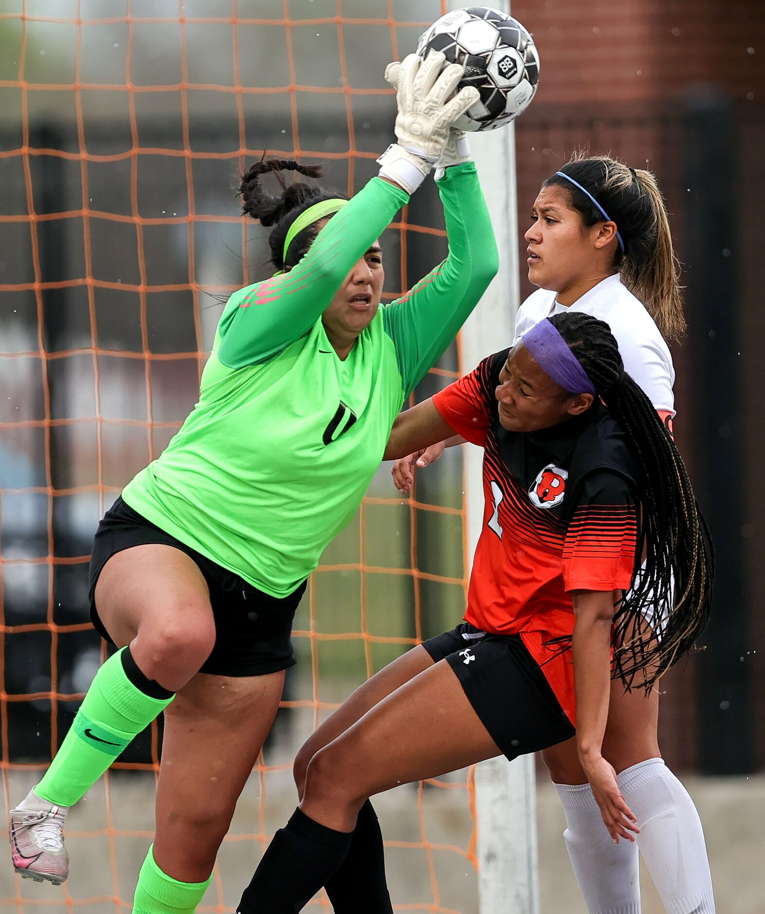 Duncanville goal tender Stephanie Pineda (0) makes a save against Rockwall Iriana Sarpy (2)...